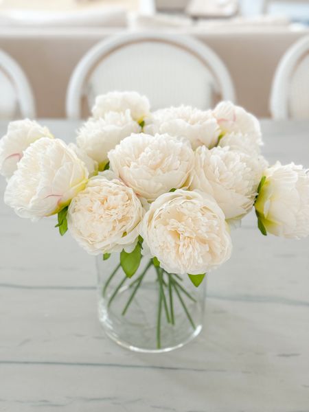 Pretty obsessed with these faux peonies! I ordered the 20 piece set in White (not bright white) but they also come in other colors and quantities. I have 14 of the 20 in this wide-mouth Walmart vase. So beautiful for spring decor!
.
#ltkhome #ltkfindsunder50 #ltkstyletip #ltkfindsunder100 #ltkseasonal #ltksalealert spring decorating ideas, artificial flower arrangements

#LTKSeasonal #LTKhome #LTKfindsunder50