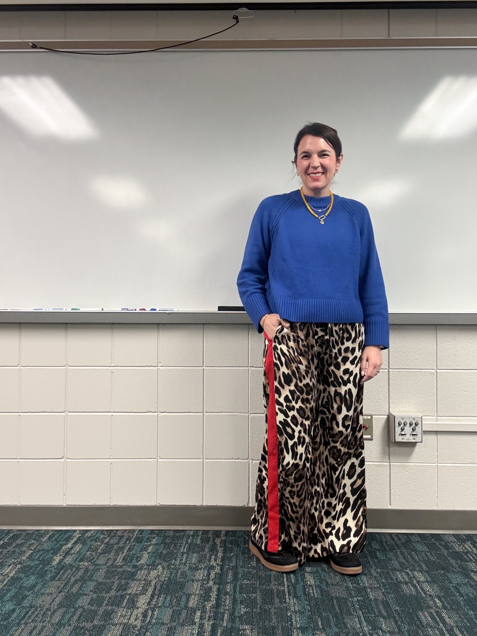 This blue sweater is just so cheerful! I’m in a medium  