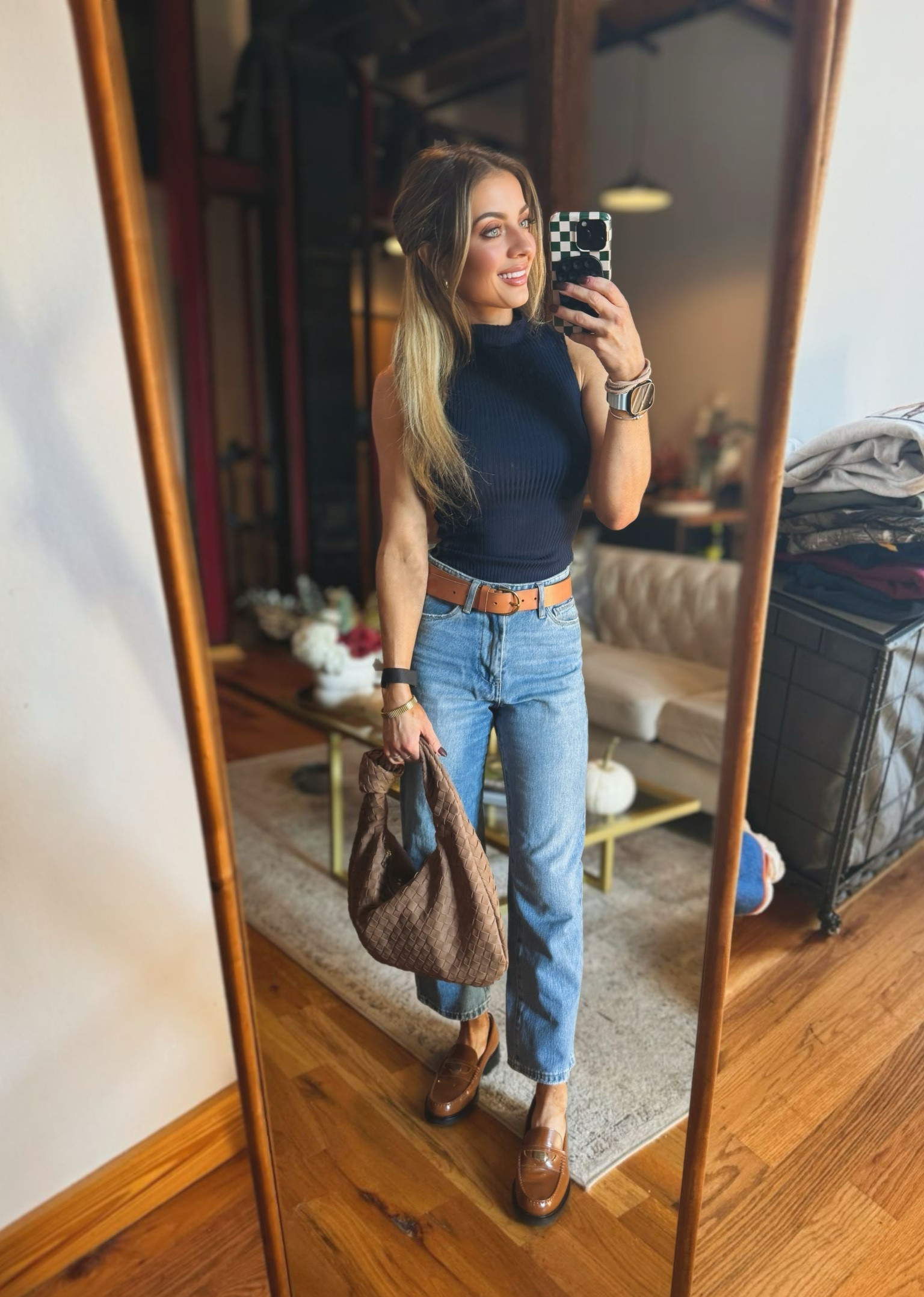 A cute navy ribbed mock neck and high waist jeans with loafers 

#LTKSeasonal #LTKWorkwear #LTKSaleAlert