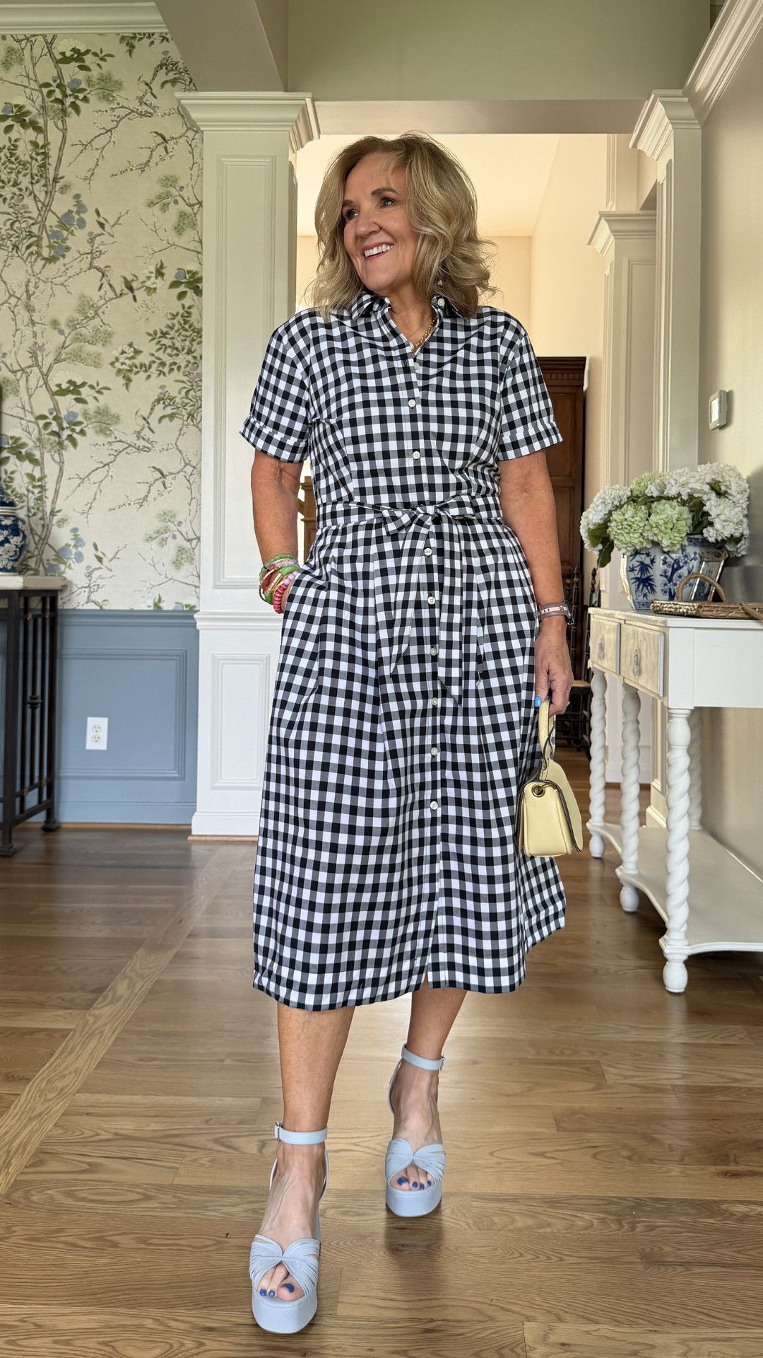 This is the kind of dress I always love having in my closet 🖤

A classic gingham dress like this is timeless, flattering, and so easy to style. It’s one of those pieces you can just throw on and instantly feel put together without needing to think about a full outfit.

I love the button-down detail and the tie waist, it gives shape without feeling too structured, and it’s really comfortable to wear all day.

You can keep it casual with simple sandals or dress it up a bit with a nicer shoe and accessories. It’s perfect for everyday wear, brunch, casual outings, or even travel. 🫶🏻 

 #LTKootd #LTKSeasonal #LTKOver40