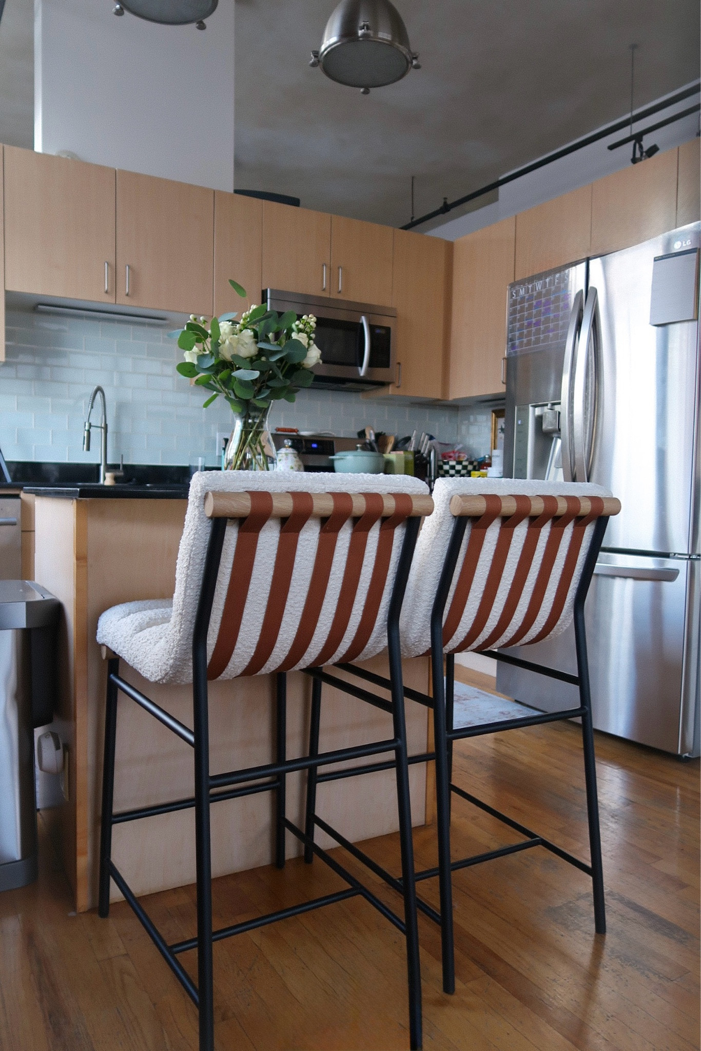 My barstools are FINALLY back in stock + 20% off today too! The quality is 12/10 and I love that they have brown leather, black iron and white boucle fabric so they tie in elements of our apartment so well. 

#LTKSaleAlert #LTKHome