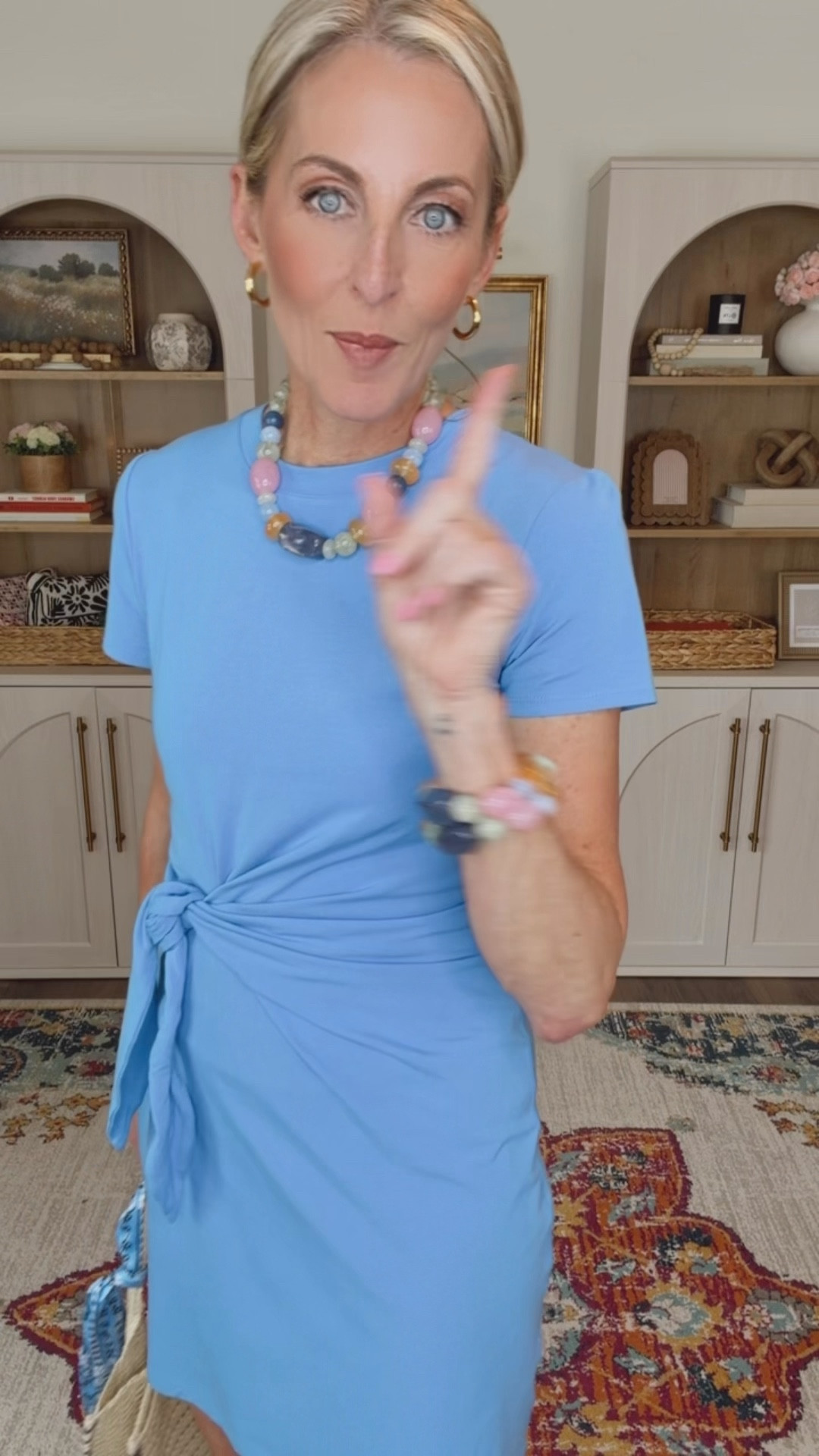 The less than $20 This front dress is perfect for casual outings to date night. This is my go to dress for any occasion that is flattering with a slight spandex feel for all day comfort.  Wear your favorite shoes and you’re good to go. Comes in four colors wearing a size small