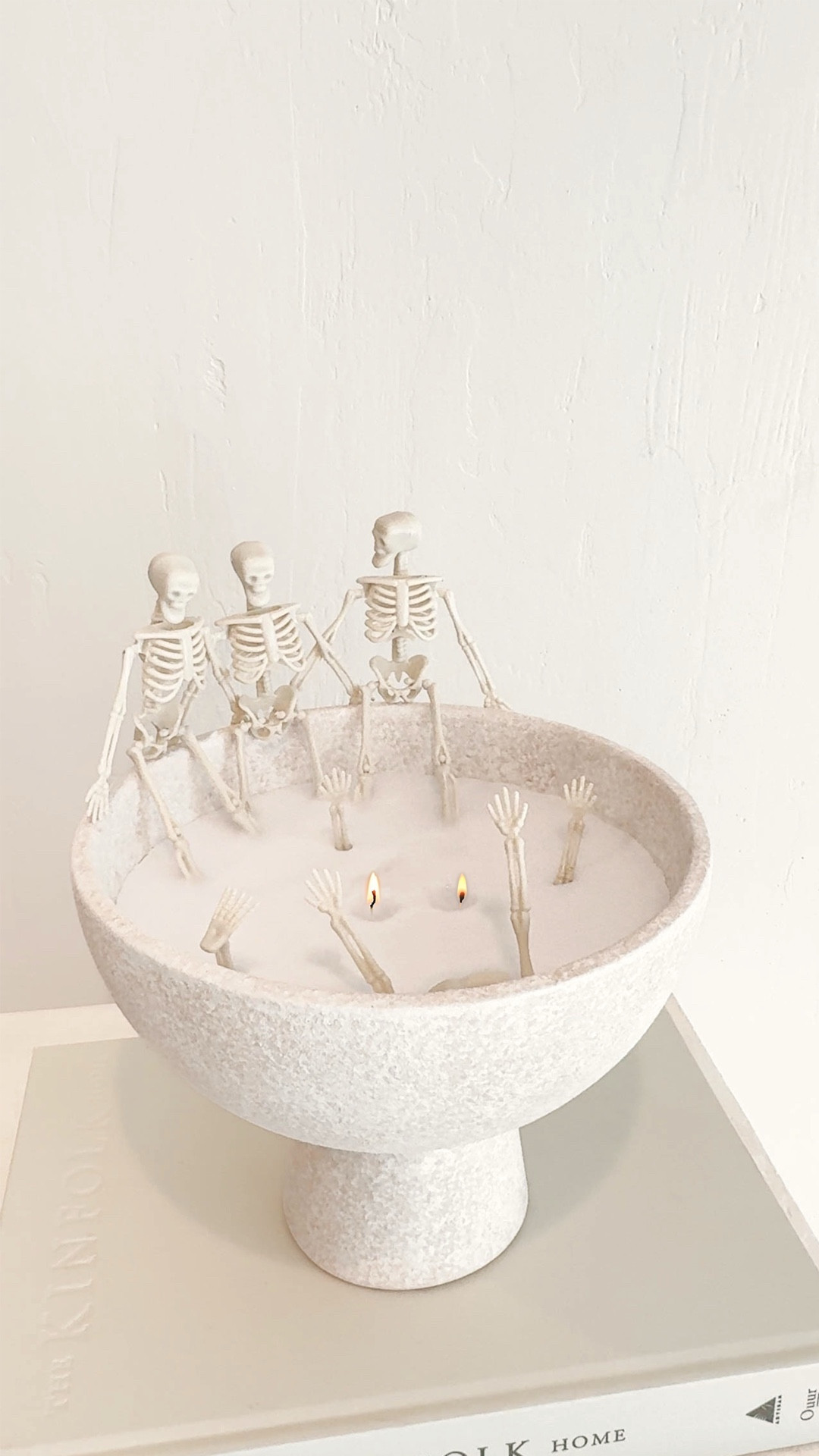 💀 Viral Skeleton Candle DIY - but make it aesthetic 💀

Comment SKELETON below to receive a DM with the link to shop this post on my LTK!💀

I couldn't believe how easy this was to make, and you can find most of the supplies at the Dollar Tree or Amazon!

*if trying this, please be careful to keep the wicks FAR away from the skeletons or use wax skeletons! (This is just for decoration and was only lit for this video)

💀SUPPLIES💀
- decorative bowl
- 5 tall candles
- candle wick kit
- mini skeletons
- hot glue
- scissors

💀HOW TO💀
+ boil a pot of water to melt your candles
+ while water is boiling, attach your candle wicks to the bottom of your bowl
+ style your skeletons on the outside & inside of your bowl using either hot glue or E600, make sure they are not too close to your wicks
+ once candles are melted, remove the wicks from the jars and pour the wax into your bowl
+ after it sets, cut the wicks and enjoy!

Comment “SKELLIE” for a link sent straight to your DM with everything you need to recreate this!

Save for inspiration and share with friends who love a good DIY.


#halloweendecor #halloweencountdown #halloweenvibes #halloweenaesthetic #halloweendiy #spookyseason #skeletoncandle #autumnmood
