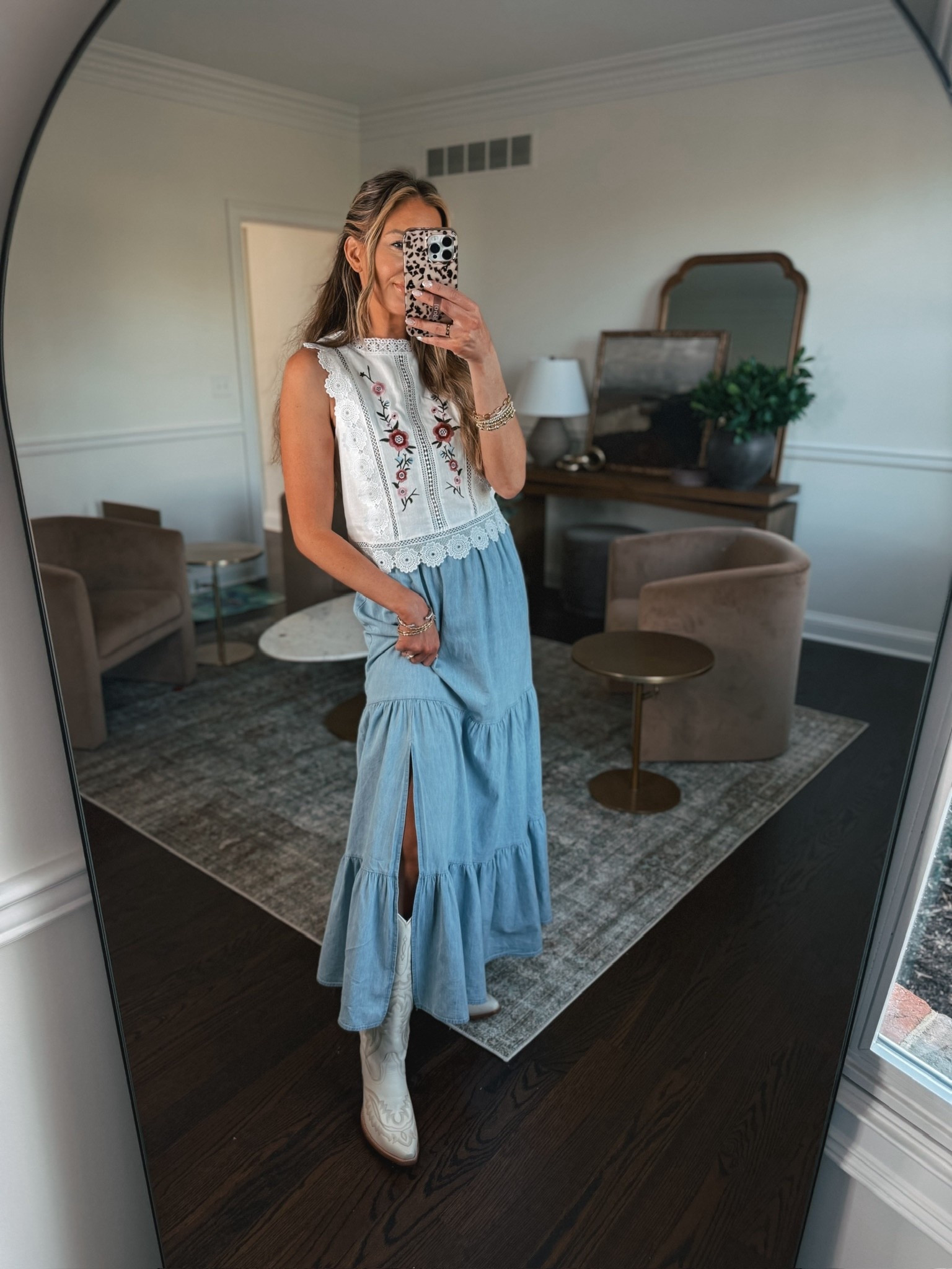 I just found this gorgeous embroidered summer top with lace trim and paired it with this chambray maxi skirt. It would be perfect for a summer country concert or festival outfit. I’m wearing it with my cowboy boots. 

#LTKootd #LTKFestival #LTKmomlife