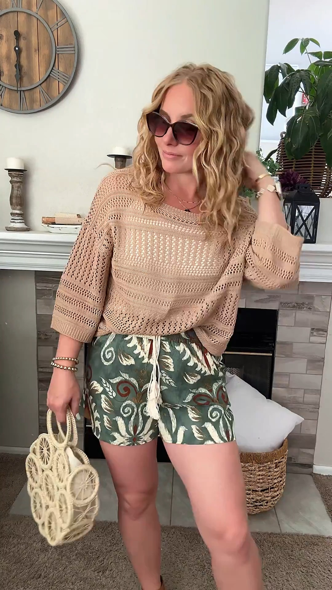 Comfy vacation outfit idea — crochet knit top over a white tank top, lightweight printed tropical shorts, platform sandals and fun summer handbag 





vacation outfits, tropical outfits, beach outfits, beach clothes, resort wear 2026, summer outfits, beach vacation outfit 

#LTKootd #LTKSaleAlert #LTKTravel