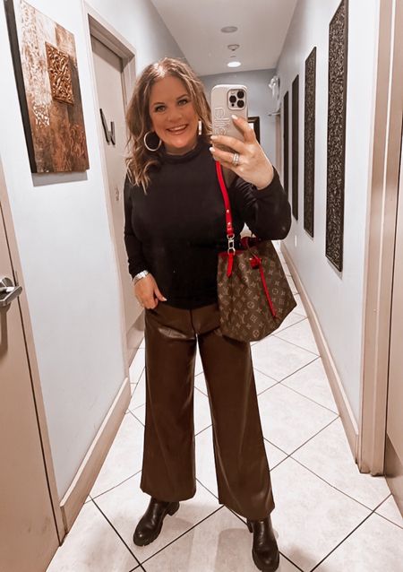  I wore these faux leather trousers to dinner last night. They are as comfortable as lounge pants. Yes, really. 
They are also on sale! The pants run TTS, size up on this top though! 😉

#LTKsalealert #LTKstyletip #LTKSeasonal