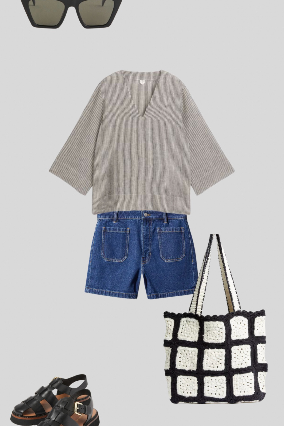A linen pop over shirt with dark blue denim shorts. A crochet bag, cat eye sunglasses and leather fishermen sandals finish the look