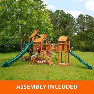 Pro Assembled Treasure Trove II Treehouse Wood Backyard Playset with Clatter Bridge, Tube Slide, and Swings Set | The Home Depot