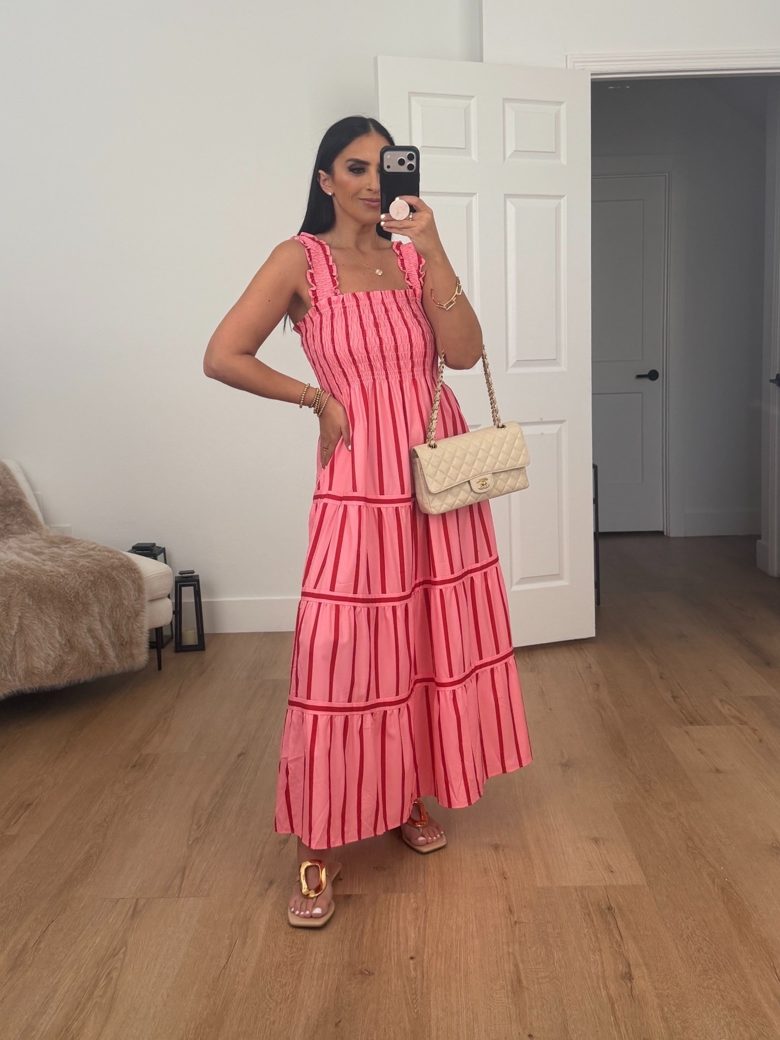 Woman’s pink striped dress. I’m wearing a size medium. 