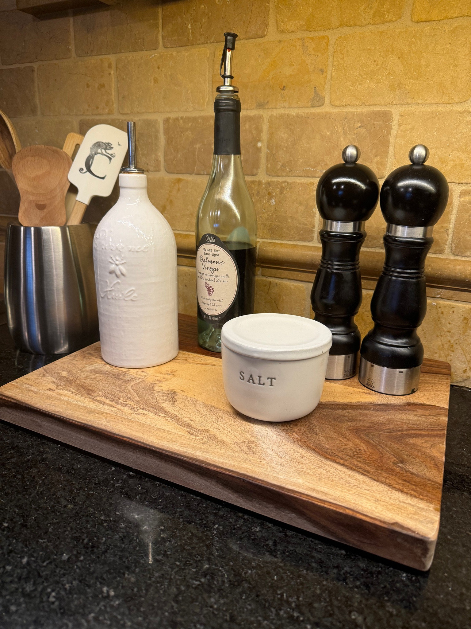 Super easy way to keep your countertop, clean and organized… 
Cutting board  - Better Homes & Gardens. Salt and pepper Mills. 
Salt container. Olive oil container. 


#LTKGiftGuide #LTKFindsUnder100 #LTKHome