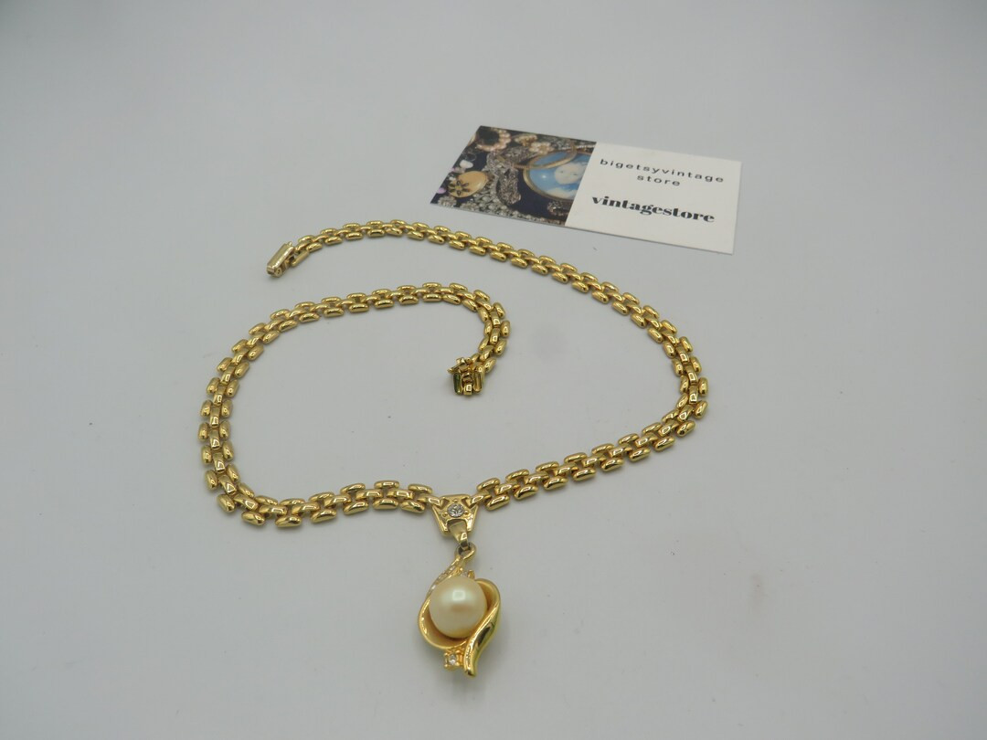 stunning vintage gold tone panther link necklace with a clear rhinestone and faux pearl hanging p... | Etsy (UK)