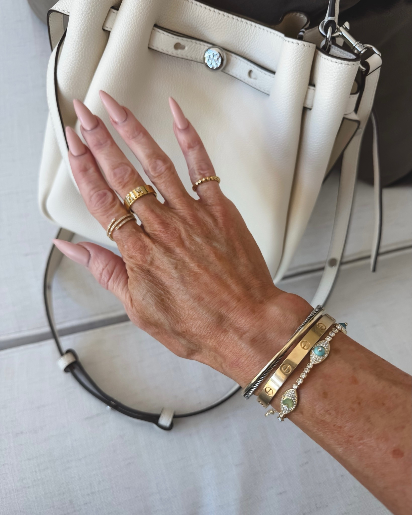 The perfect summer ivory bucket bag you can carry a variety of ways… I own and LOVE💕
I think this is the most precious bag for easy summer days! Any of my jewelry, some are personalized, would also make great gift ideas!! 
Tank sz small, Linking a super similar skirt
Summer amazon outfit idea, denim midi skirt, tank top 

#LTKootd #LTKOver40

#LTKU #LTKmomlife