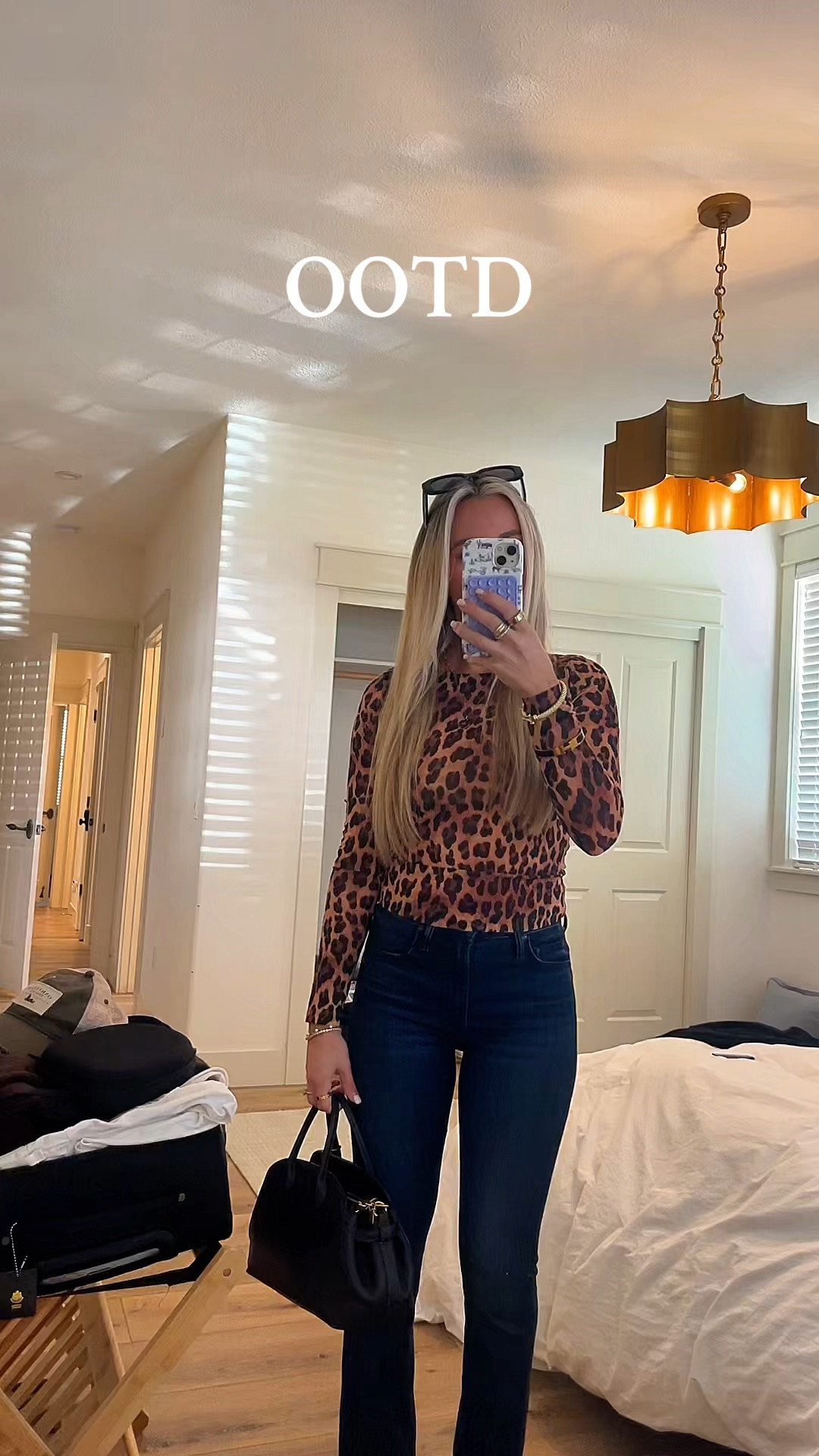 Throwback to a girls lunch + shopping moment from a Bach trip 🤍 Leopard, denim, and gold details will always have my heart. Linking everything I wore (and close matches) so you can recreate this exact vibe! 
•
•
•
bachelorette outfit inspo
girls lunch outfit
shopping day outfit
leopard print top outfit
alice and olivia leopard top
mother denim bootcut jeans
revolve denim finds
amazon black heels gold heel
slingback stiletto heels
coach bag outfit
coach chain strap
amazon sunglasses women
tiktok shop earring stack
gorjana chain bracelet
gorjana pearl bracelet
swarovski tennis bracelet
hermes bracelet style
david yurman bracelet look
oura ring outfit
amazon ring stack
cartier love ring dupe
luxury jewelry stack
elevated girls trip outfit
bach weekend outfit ideas
ltk fashion finds
ltk outfit inspo
neutral glam outfit
leopard outfit styling
chic daytime outfit

#LTKFindsUnder50 #LTKootd #LTKSaleAlert