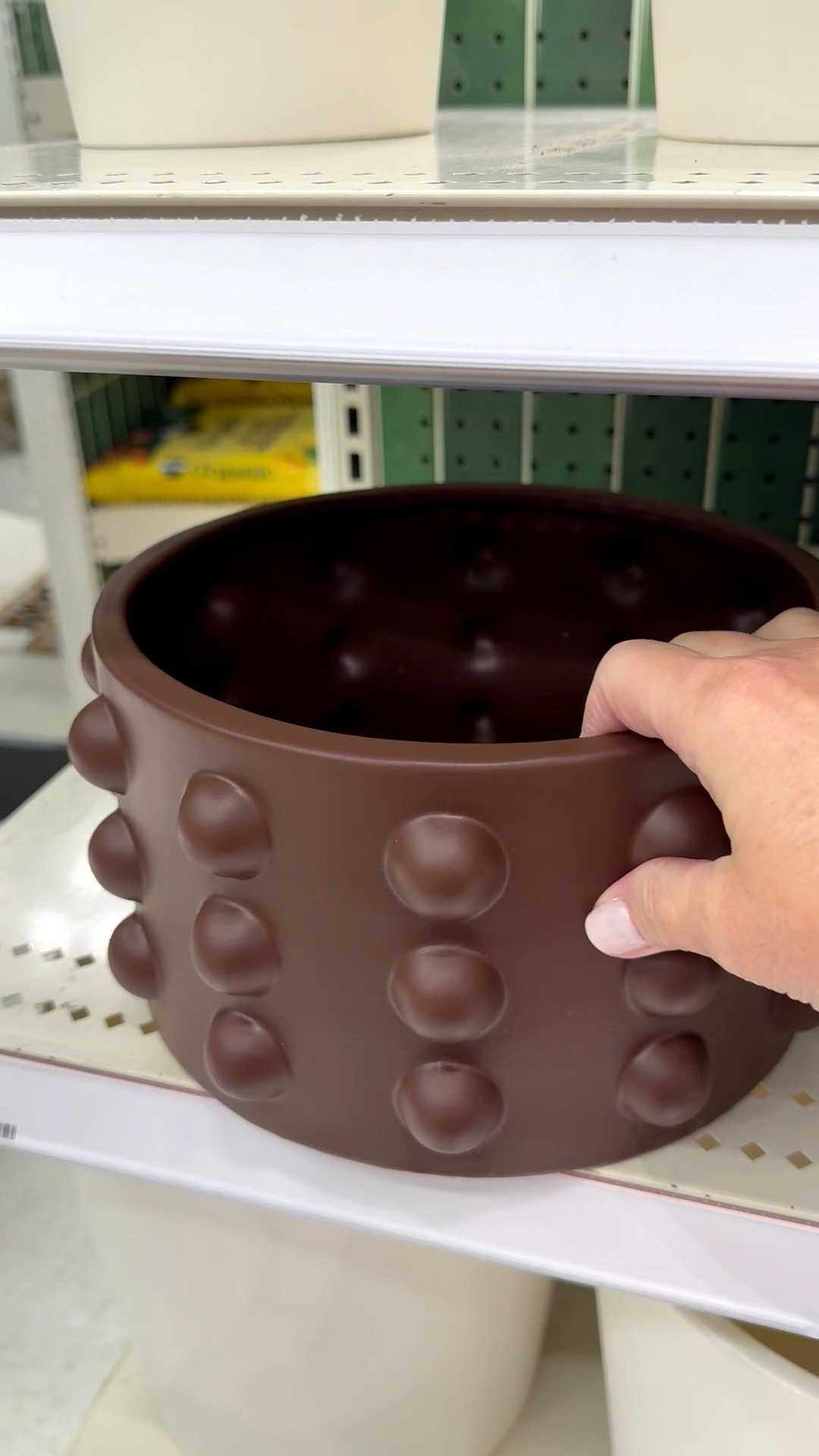 This is a bold planter just begging for an equally bold plant. 🔥 I love the chocolate brown color and tactile feel of the raised dots. There’s a drainage hole plus a plug so it’s perfect for indoors or outdoors. 

And if you’re a mosaic artist, this would be a fun substrate for your tile work too! For mosaic tips, tutorials + inspiration please visit my YouTube channel: YouTube.com/julieweilbacher, and follow @julieweilbacher on Instagram.

#modernplanter #brownplantpot #ceramicplantpot #target #texturedplanter #mosaic #indoorplanter #outdoorplanter #plantpot #flowerpot

#LTKSeasonal #LTKHome