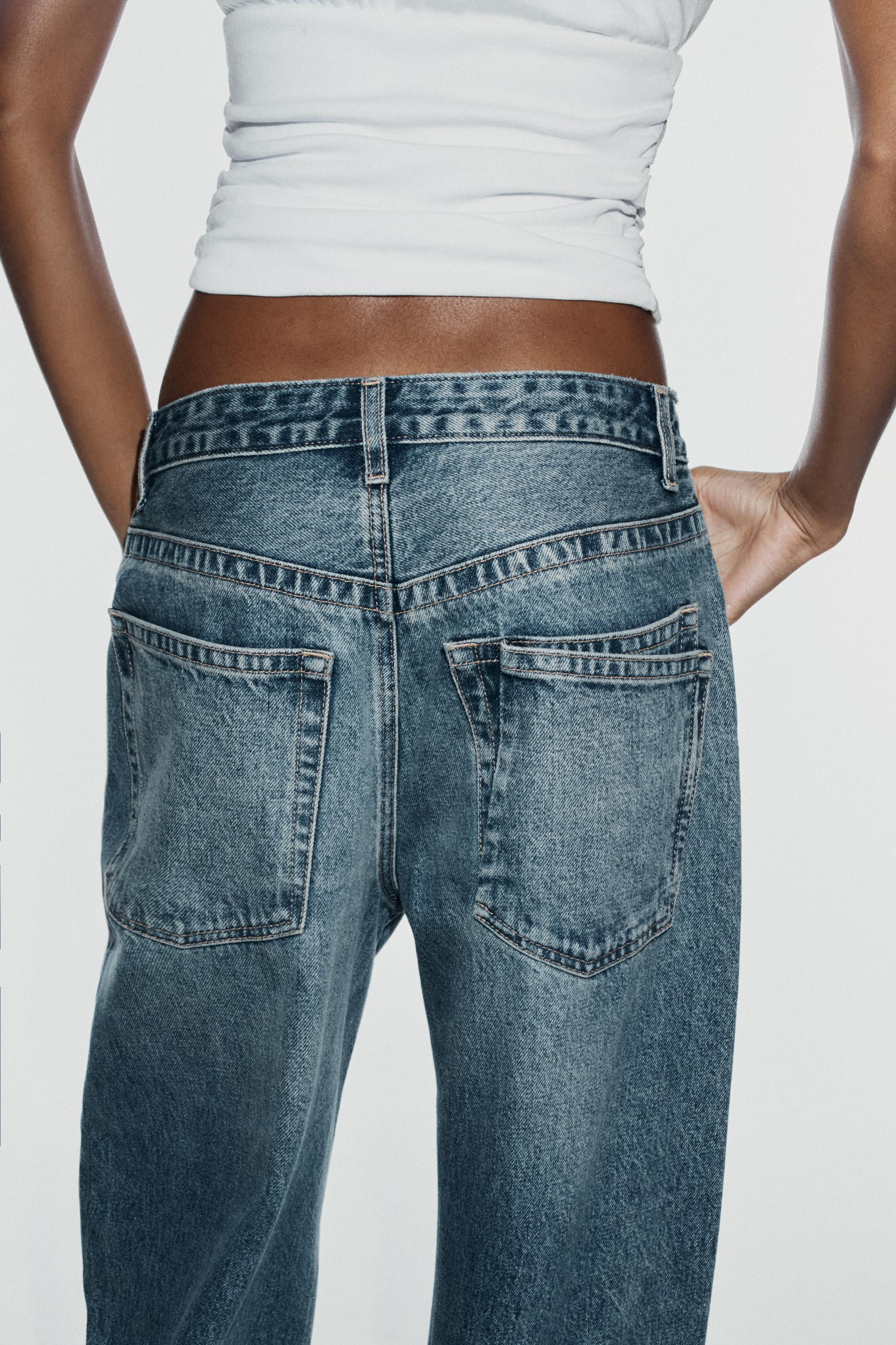 MID RISE - BAGGYMid-rise jeans featuring belt loops and a five-pocket design. Wide leg. Front zip... | Zara US