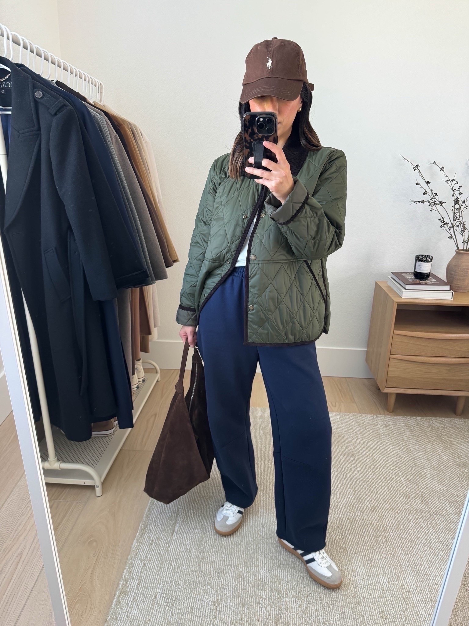 2025 bestselling pants: Everlane luxe barrel sweats. 

These are so comfy and cozy. Love how they fit petites at full length. I sized up, but you don't need to. Comfy high rise and great for my life. 

Madewell tee xs
Barbour jacket US 8
Everlane barrel sweats small
adidas Samba navy 4.5 mens
Polo Ralph Lauren hat
Liffner Hobo Pillow bag 

Petite style, athleisure, mom outfits 

#LTKootd #LTKmomlife #LTKPetite