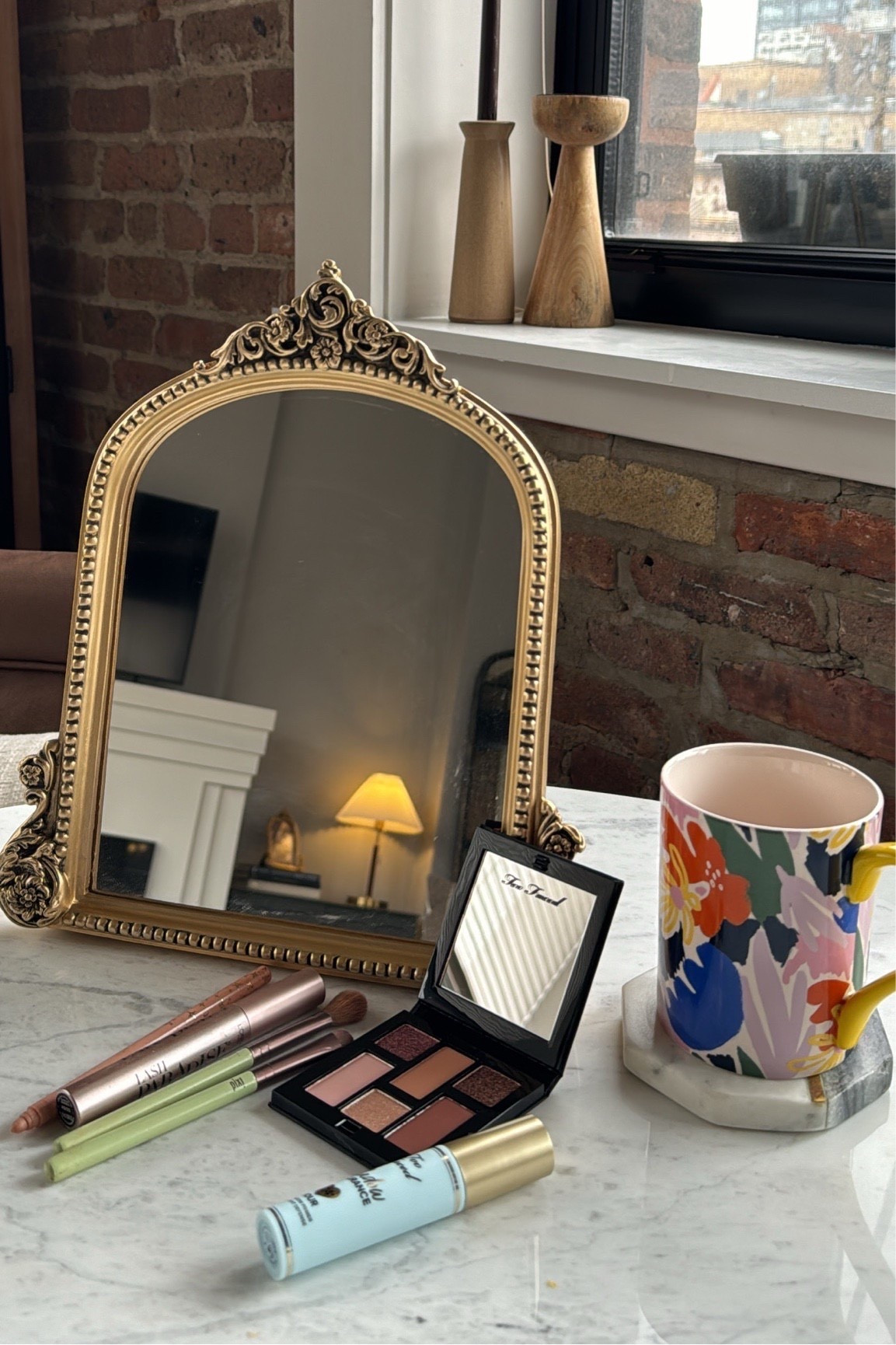 DIY vanity set up in my Chicago loft! Love this Anthropologie look for less mirror for me to do my makeup with! 

#LTKBeauty #LTKHome #LTKGiftGuide