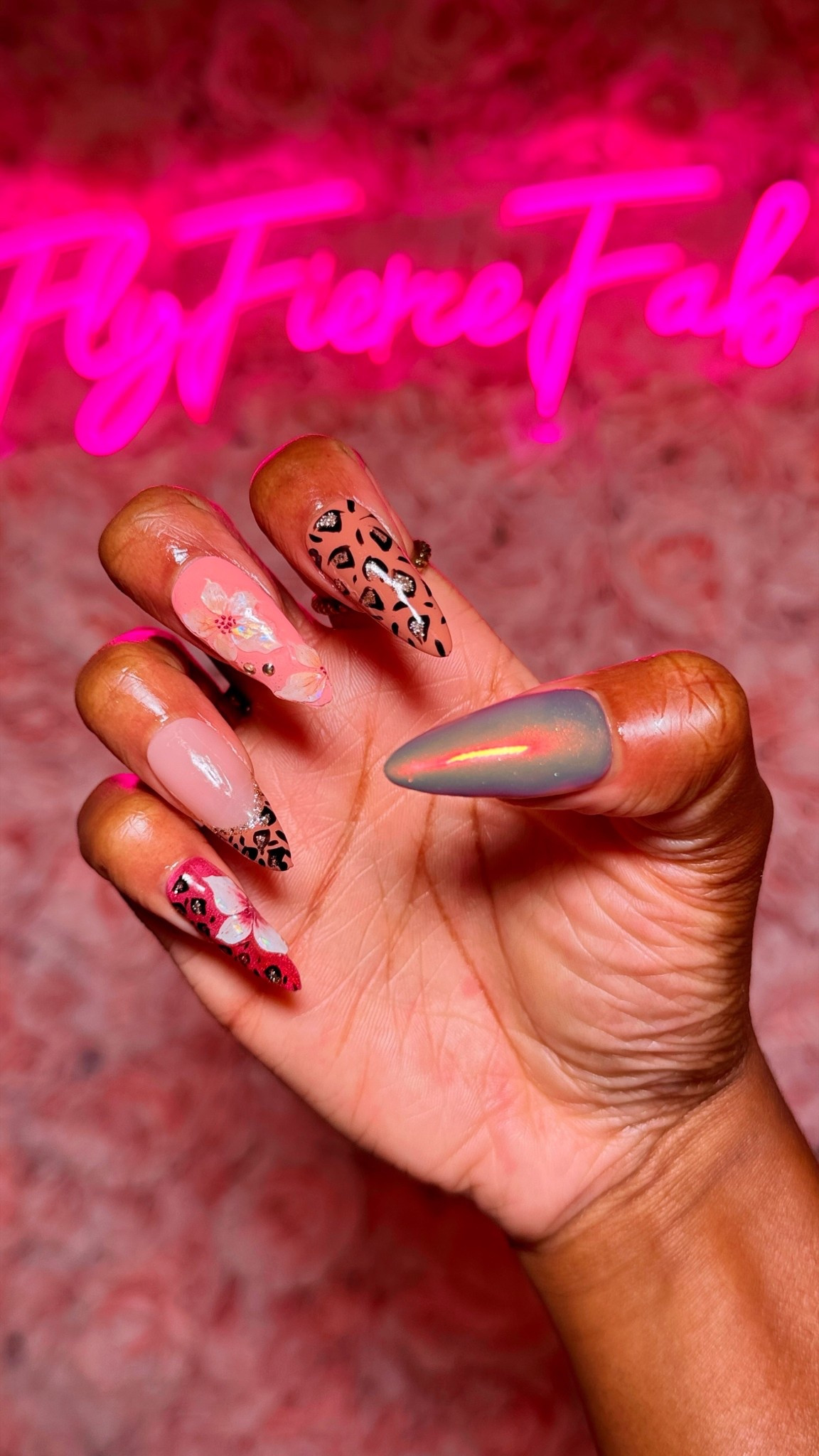 I made this long almond press on nail set to go with my leopard dress I’m wearing to an event 🐆 💅🏾✨. They came out so cute!

I got everything that I used on Amazon, I freehanded the leopard print design, and added floral nail stickers.

I love how the chrome came out, it looks so pretty when the light hits it! I went with a new topcoat this time, by GAOY and it’s my new favorite for gel nails. 

Y’all want a tutorial on how I made this set? 👀

#LTKBeauty
