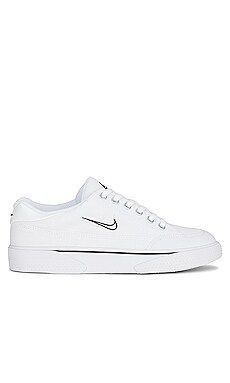 Nike Retro GTS Sneaker in White & Black from Revolve.com | Revolve Clothing (Global)