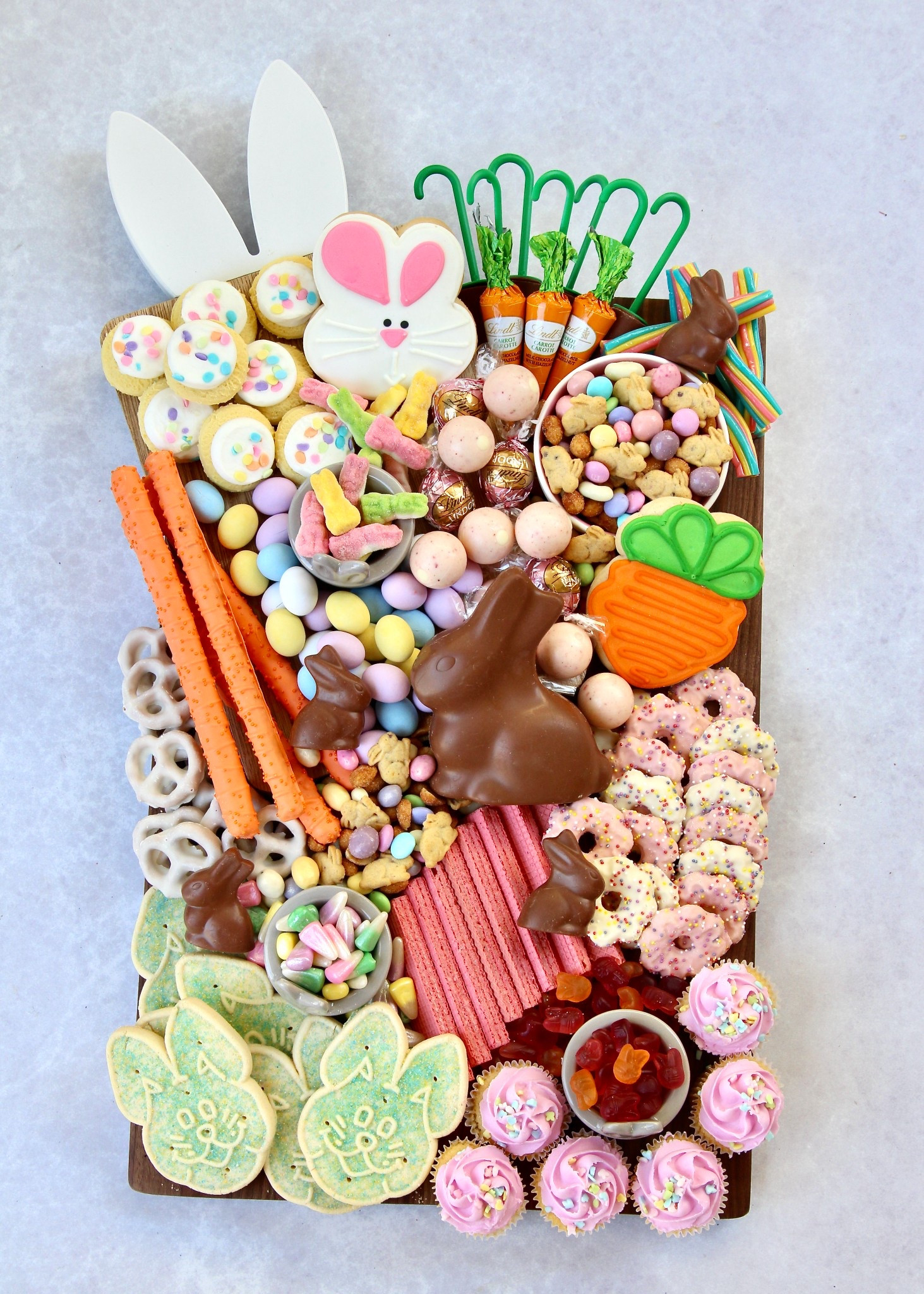 A board topped with your favorite Easter treats is a great way to showcase the flavors and colors of springtime!

#LTKParties #LTKSeasonal