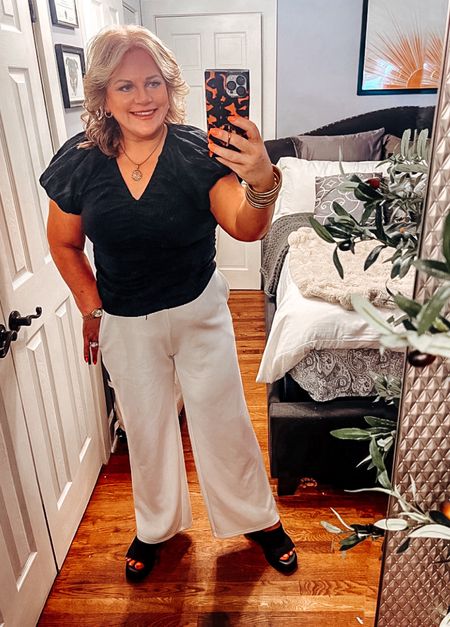 These pants that I wore to work today are from the lounge set I shared a few weeks back. Aside from being super comfy, it can be worn as separate as well.
I have it paired here with an adorable top from Loft. This top is also versatile. Put it with a pair of cutoff denim jeans on the weekend. Also, wearing my favorite ‘90’s inspired slide sandals.
Work outfit, summer outfits, office , Amazon,  Loft, affordable outfits 

#LTKFindsUnder50 #LTKFindsUnder100 #LTKSeasonal