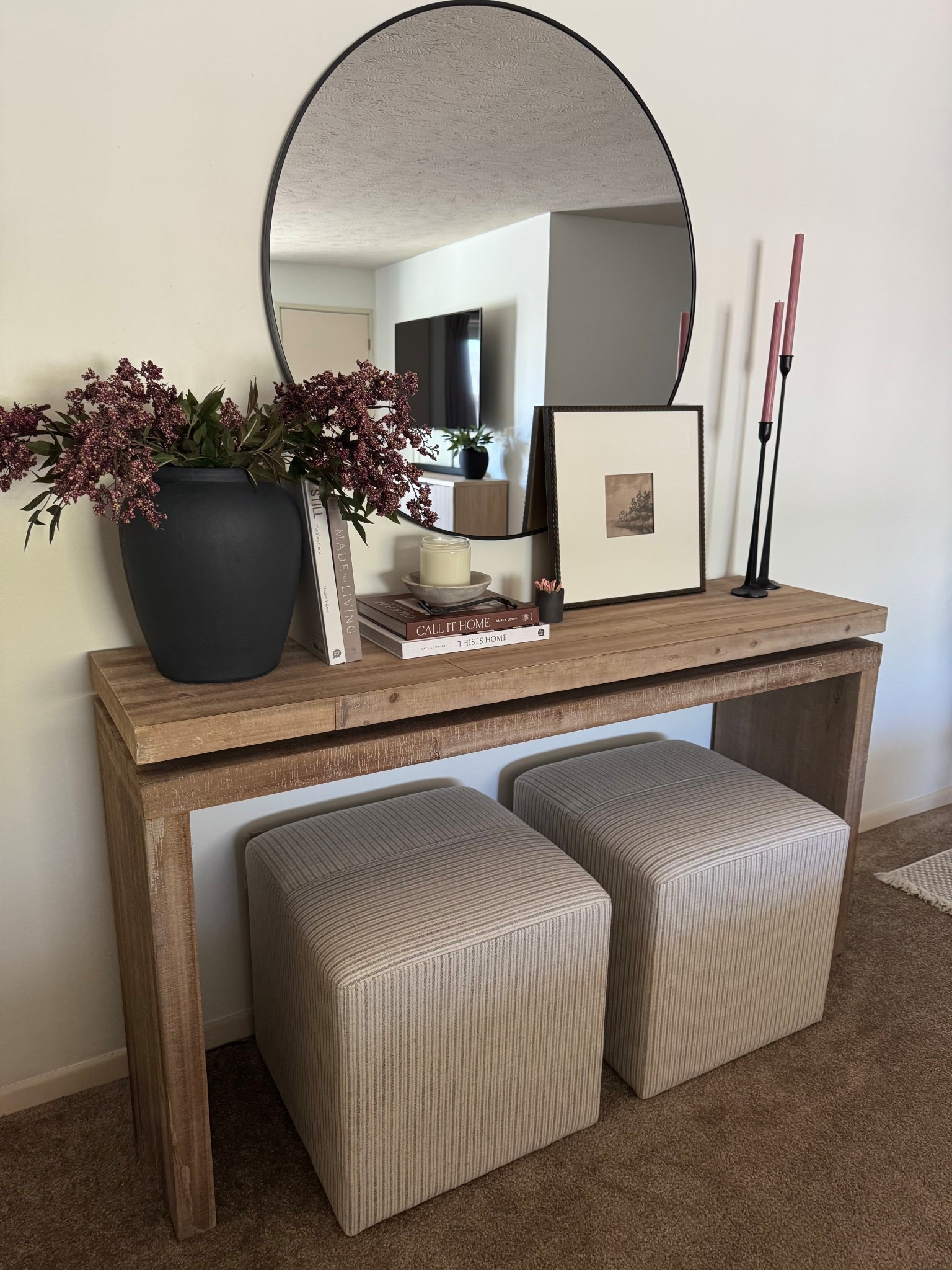 Berry stems, nandina stems, spring stems, stripe ottoman, arwah console table, pb dupe, pb table, console table, wood console table, round mirror, coffee table books 

#LTKSeasonal #LTKSaleAlert #LTKHome