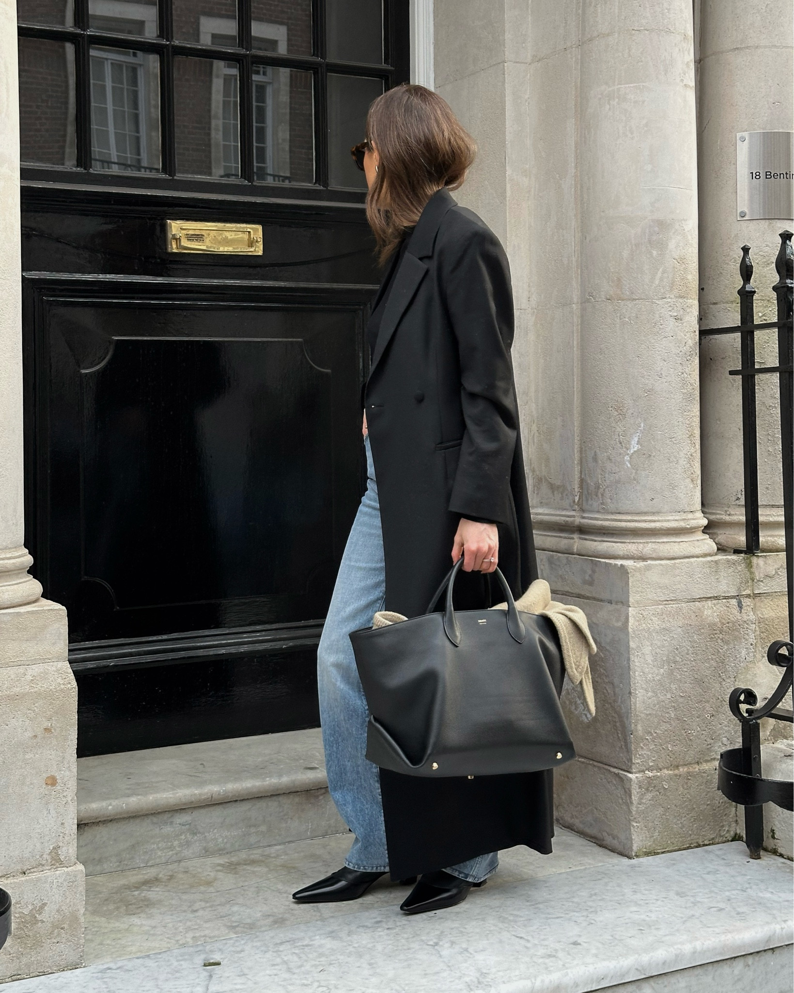 Went back and forth on what size to take in the coat but landed on a 34. It has very wide shoulders and nips at the waist. 