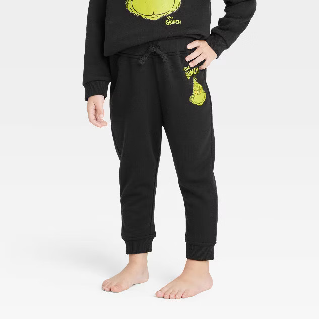 Toddler The Grinch Printed Jogger Pants - Black | Target