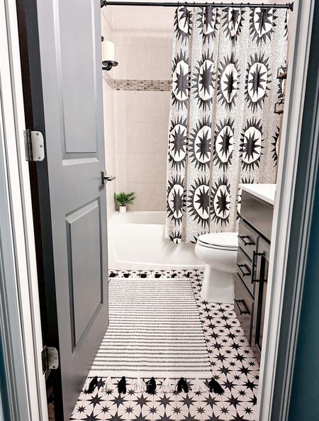 Guest bathroom is smaller but we have lots of storage and little decor have to paint lol have had it for a year and months #bathroom #bathroomdecor #showercurtain #justinablakeney #bohobathroom #blackandwhirebathroom  

#LTKhome #LTKstyletip #LTKSeasonal