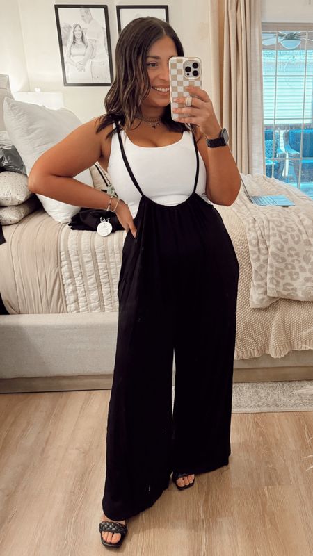 I’ll be wearing this all spring long! A petite friendly wide leg black jumpsuit from Amazon. I paired with a cropped white tank but you can do any color. I did black heeled sandals but white sneakers or cute flats would be nice too. Amazon spring outfit, summer outfit, jumpsuit

#LTKSeasonal #LTKfindsunder50