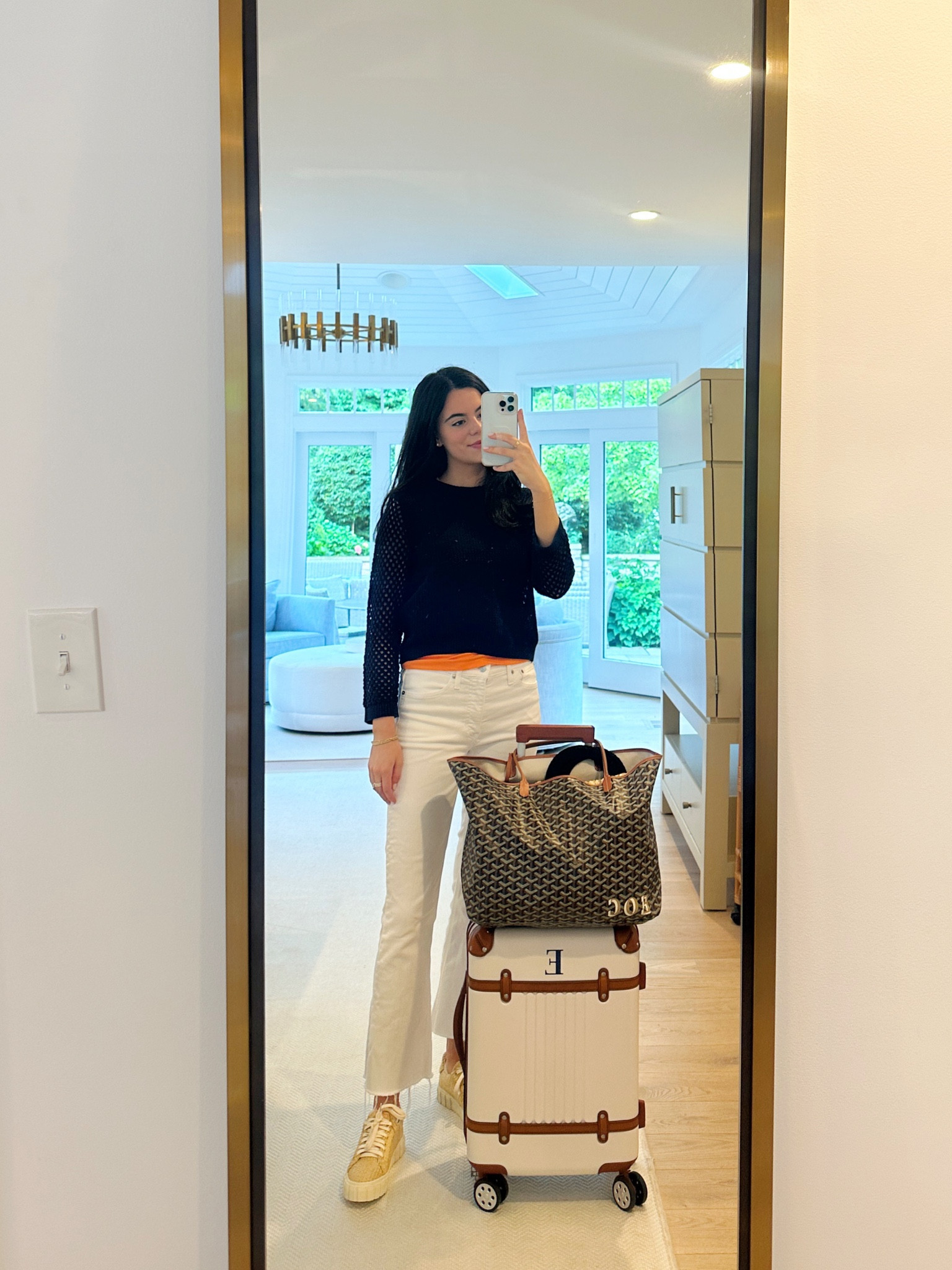 Travel ootd!✈️ Wearing these new raffia sneakers from Farm Rio and this light navy crochet sweater from J.Crew with an orange tank underneath for a little extra color! Such a comfortable and put together look!🍊

#LTKtravel #LTKSeasonal #LTKFind