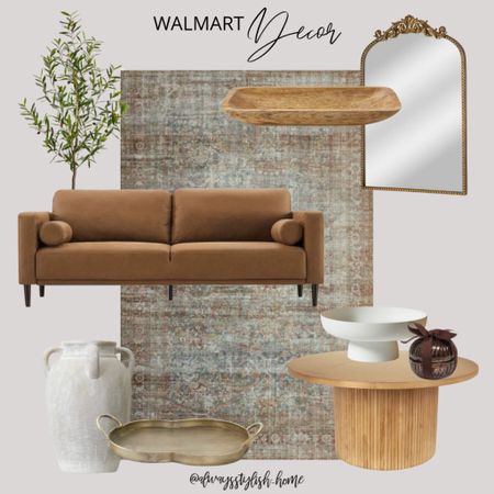 Walmart living room inspo, home decor, brown rust modern sofa, brown rust green Lolo is rug, arch top mirror, cream terracotta vase, gold tray with handles, fluted coffee table, white pedestal bowl, brown glass pumpkin candle, wood dough bowl tray, olive tree  

#LTKhome