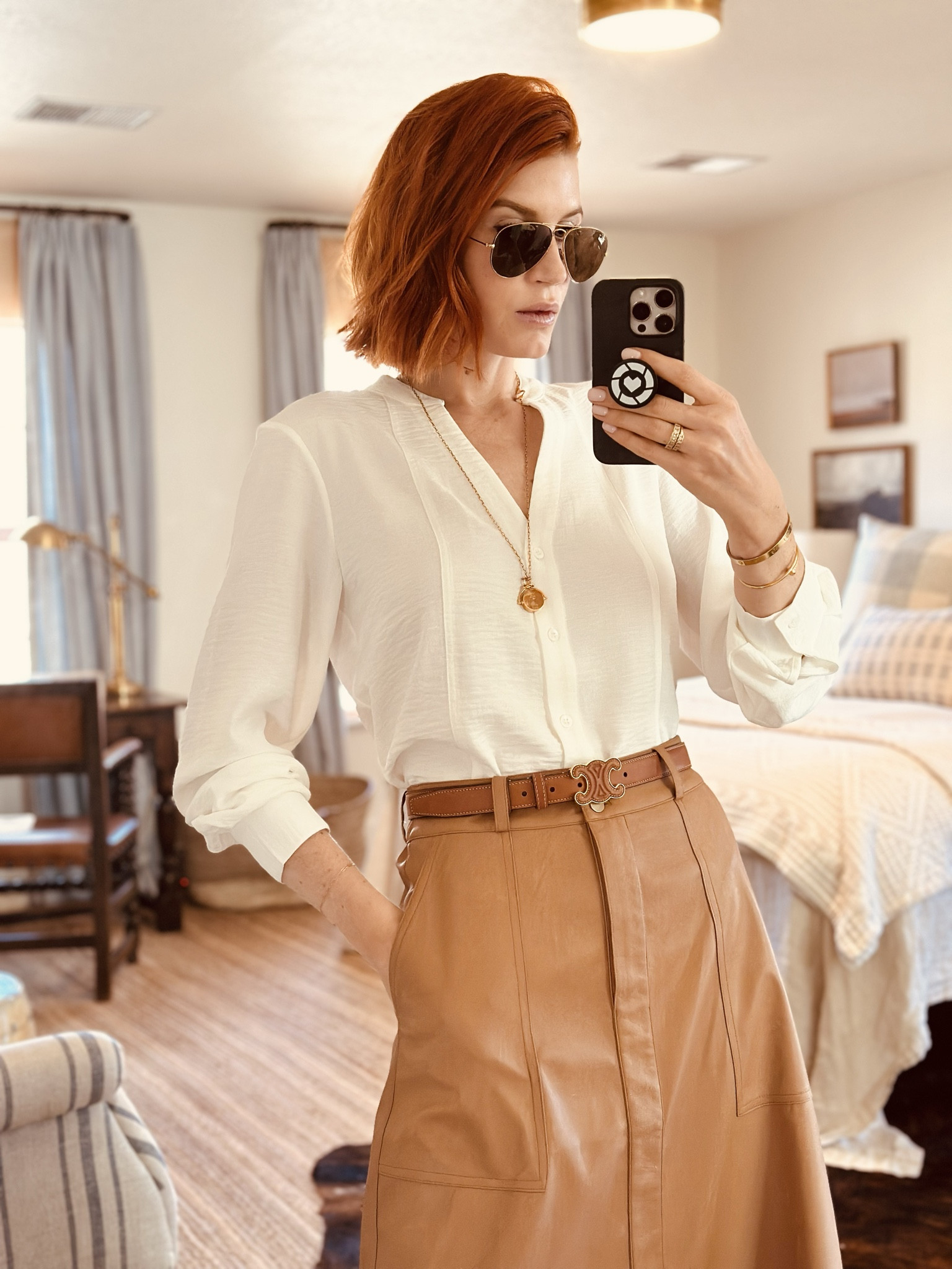 *New business casual look*
This one is made up of what I call “wardrobe-builders” - pieces that layer well with others and that are classic- the ones you keep! 
I added very minimal accessories to keep this look fresh. My Celine leather belt has been getting a ton of use lately and really sets the tone for this look. My (several seasons old) Celine necklace nods to the gold on the belt and is the right length for this top (you could also put jewelry in the neckline).
Wear this look with fisherman sandals, boots or heels. It also layers well with a denim jacket or longer coats in the same color family. 


#LTKworkwear #LTKover40 #LTKtravel