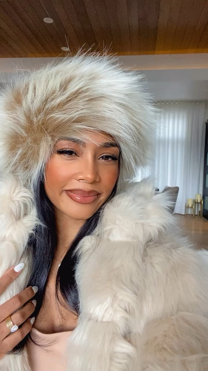 You can never go wrong with fur! I linked some comparable options to achieve this look. 

TheJalesaNicole, winter outfit, fur coat, fur  hat, sun shades

#LTKTravel #LTKStyleTip #LTKSeasonal