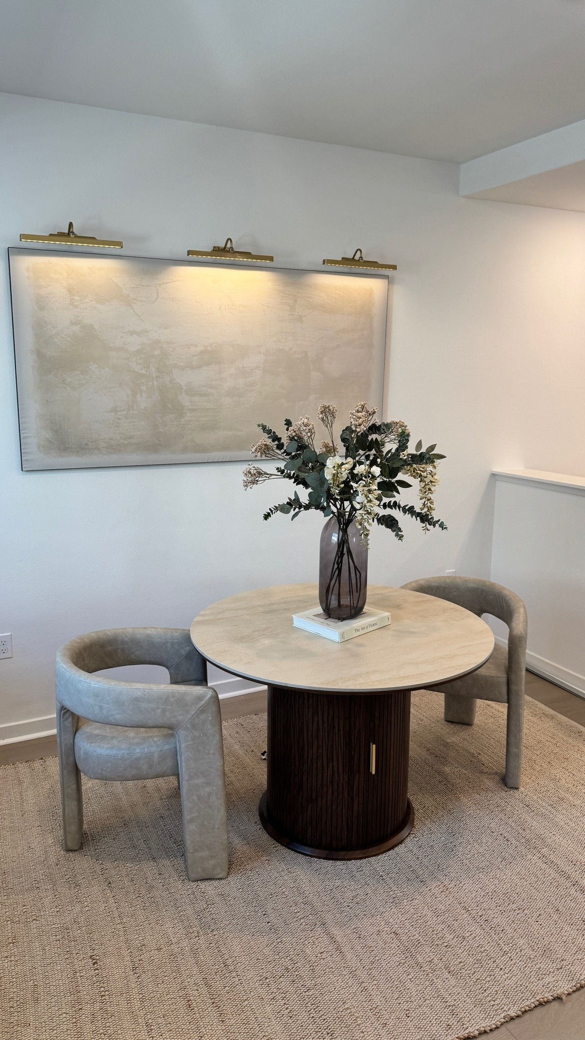 the perfect stone table does exist🤩

If you're looking for a dining table that's beautiful but can actually handle real life, you need to see this one.

I wanted something modern and elevated, but also practical enough for everyday meals, hosting friends, and all of life's little messes. This table checked every single box.

First, the tabletop is made from sintered stone, which means it's incredibly durable. It's heat-resistant, scratch-resistant, and stain-resistant—which, honestly, is a must in my home. I don't have to stress about hot dishes, spills, or everyday wear and tear, and it still maintains that beautiful high-end look.

One of my favorite features is the hidden storage. It has built-in shelves that are adjustable and removable, so you can customize the space however you need. I love being able to keep extra dishes, table linens, and entertaining essentials tucked away but still easily accessible.

The slatted sliding doors add such a beautiful designer touch. The groove texture gives it a clean, modern, and premium feel that instantly elevates the entire room. It honestly looks like something you would see in a luxury home.

It also comes in two sizes—43-inch and 55-inch—and in both Walnut and Black finishes, so it's easy to find the perfect fit for your space. This piece completely transformed my dining area, and I love that it's both functional and beautiful. If you've been searching for a statement piece that can actually keep up with everyday life, this is definitely one to check out!

#diningtable #diningroom #diningroomtable #stonetable #neutralhomedecor #homedecor #woodtable

#LTKHome #LTKSaleAlert