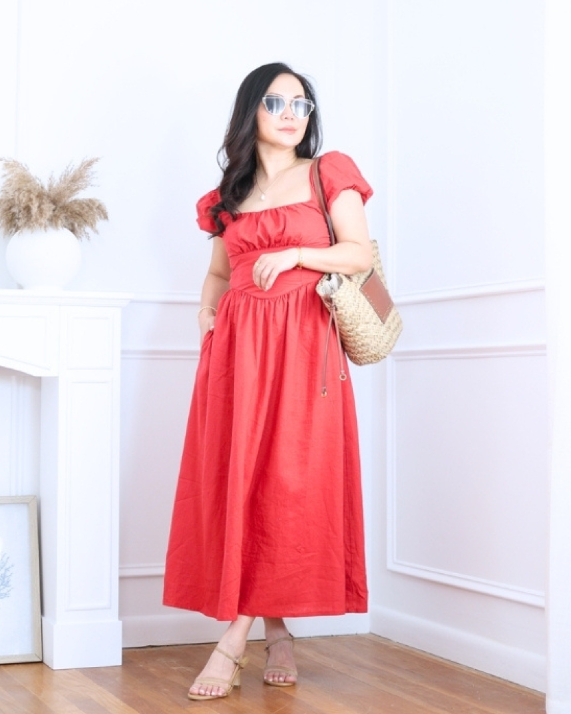Red drop-waist dress from GAP paired with a straw bag and Quince strappy heels — playful, bold, and effortlessly chic for warm-weather days and nights. I'm 5'2, wearing size S. 

 #LTKootd #LTKOver40 #LTKPetite