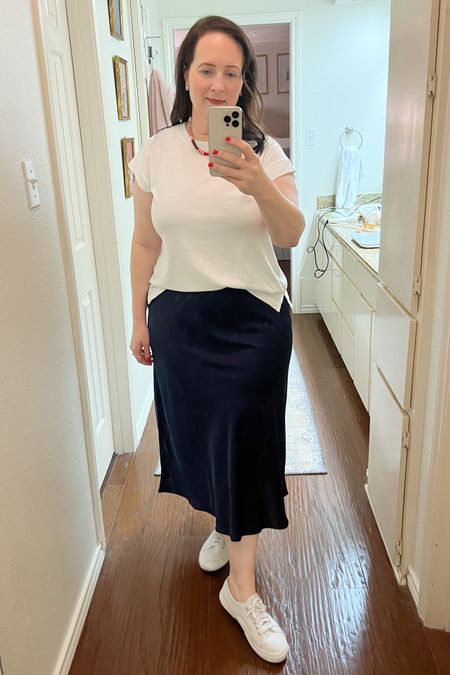 Took a navy slip sort and dressed her way down for a casual summer look  

#LTKSeasonal #LTKcurves #LTKworkwear