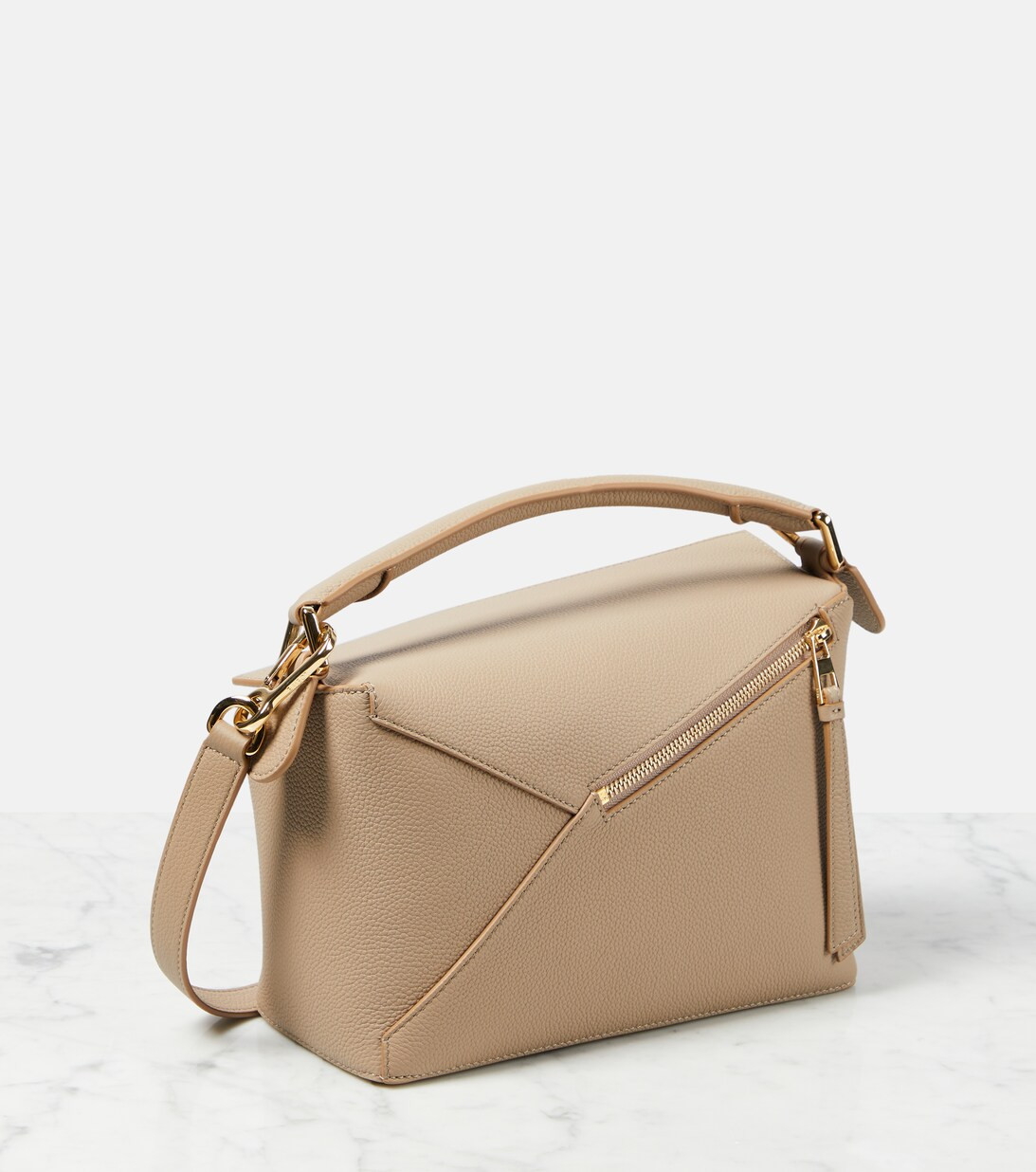 Puzzle Edge Small leather shoulder bag | Mytheresa (UK)