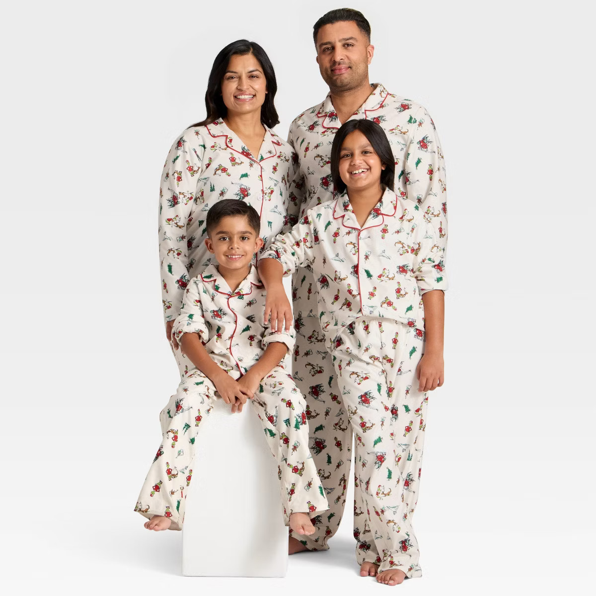 Kids' The Grinch Long Sleeve Shirt and Pants Holiday Matching Family Sleep Pajama Set - Cream | Target