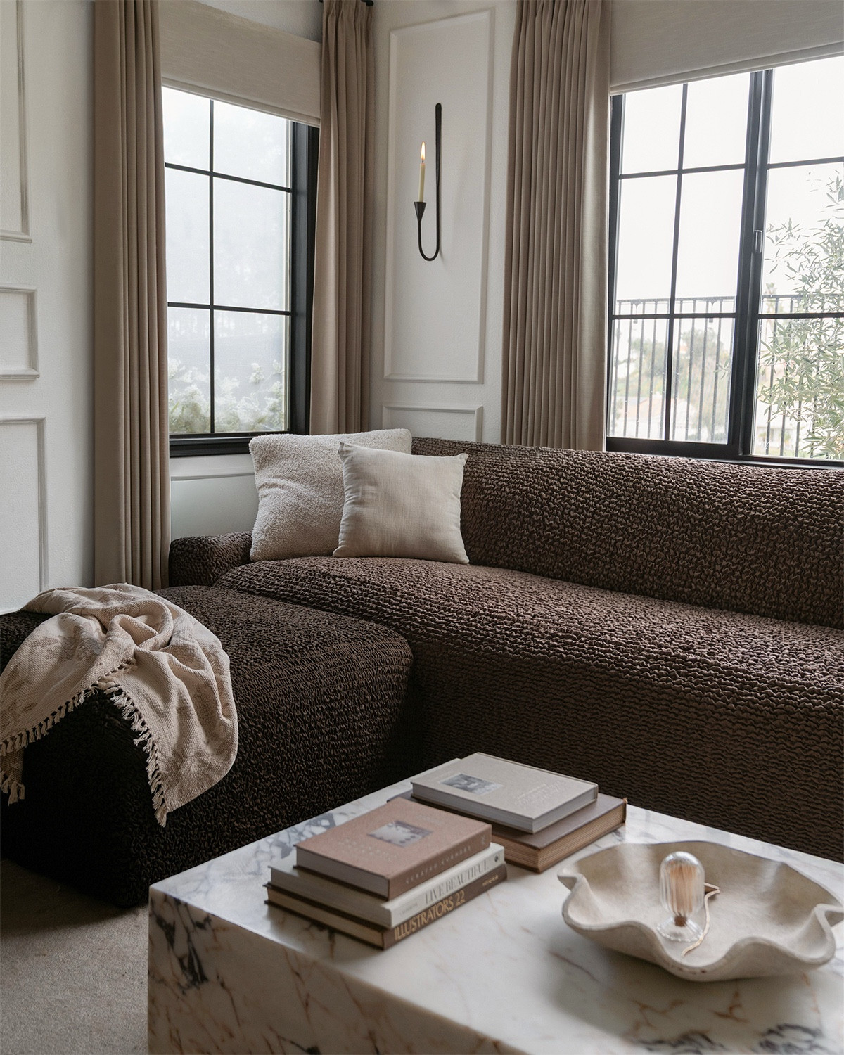 Okay but why are we acting like a whole new couch is the only option?

If you’re bored of your space but not trying to drop thousands… this is your sign. I swapped ours with covers from @mammamiacovers Comfort Collection and it completely changed the vibe. Same couch. Totally different energy.

It’s the easiest way to test a new color before committing. Live with it. See how it feels in your light. With your floors. With your life. And if you hate it? You didn’t just buy a brand-new sofa.

I ordered the shade Dark Brown and I’m obsessed. It’s rich, warm, and makes the whole room feel grounded — but they have so many beautiful colors. Use code EVA50 for 50% off 🤍

This exact brand isn’t on LTK, but you can shop it here:
https://mammamiacovers.com/products/comfort-4-seater-sofa?variant=32302815641662

Otherwise, I linked similar here for you!
.
.
.
#mammamiacovers #slipcovers #sofacover  #livingroominspo #cozyhome #interiorstyling couch covers living room refresh neutral home decor budget friendly decor comfort collection sofa makeover warm interiors modern vintage home styling home update rental friendly decor brown couch neutral aesthetic cozy living room home inspiration simple upgrades

#LTKHome