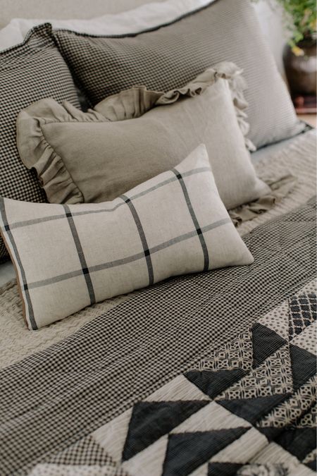 a fall layered bed feature this beautiful tonal reversible patchwork quilt 

#LTKhome #LTKSeasonal