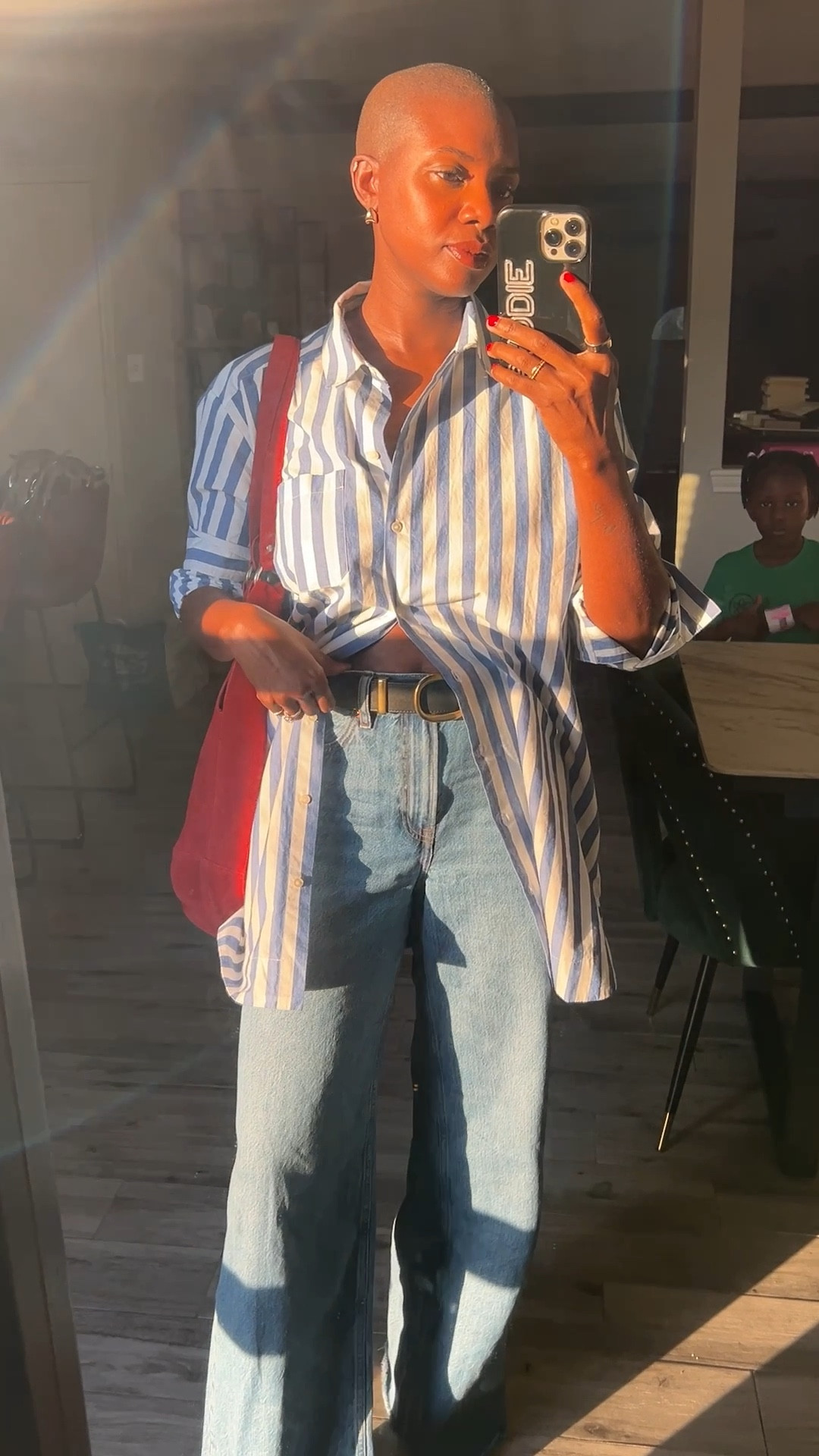 Casual fall outfit! Blue & white striped shirt dress (I’m wearing a 38), red suede purse, high rise wide leg jeans (I’m wearing a 27), black leather slides and kaja lip gloss  

#LTKFallSale #LTKFindsUnder50 #LTKFindsUnder100