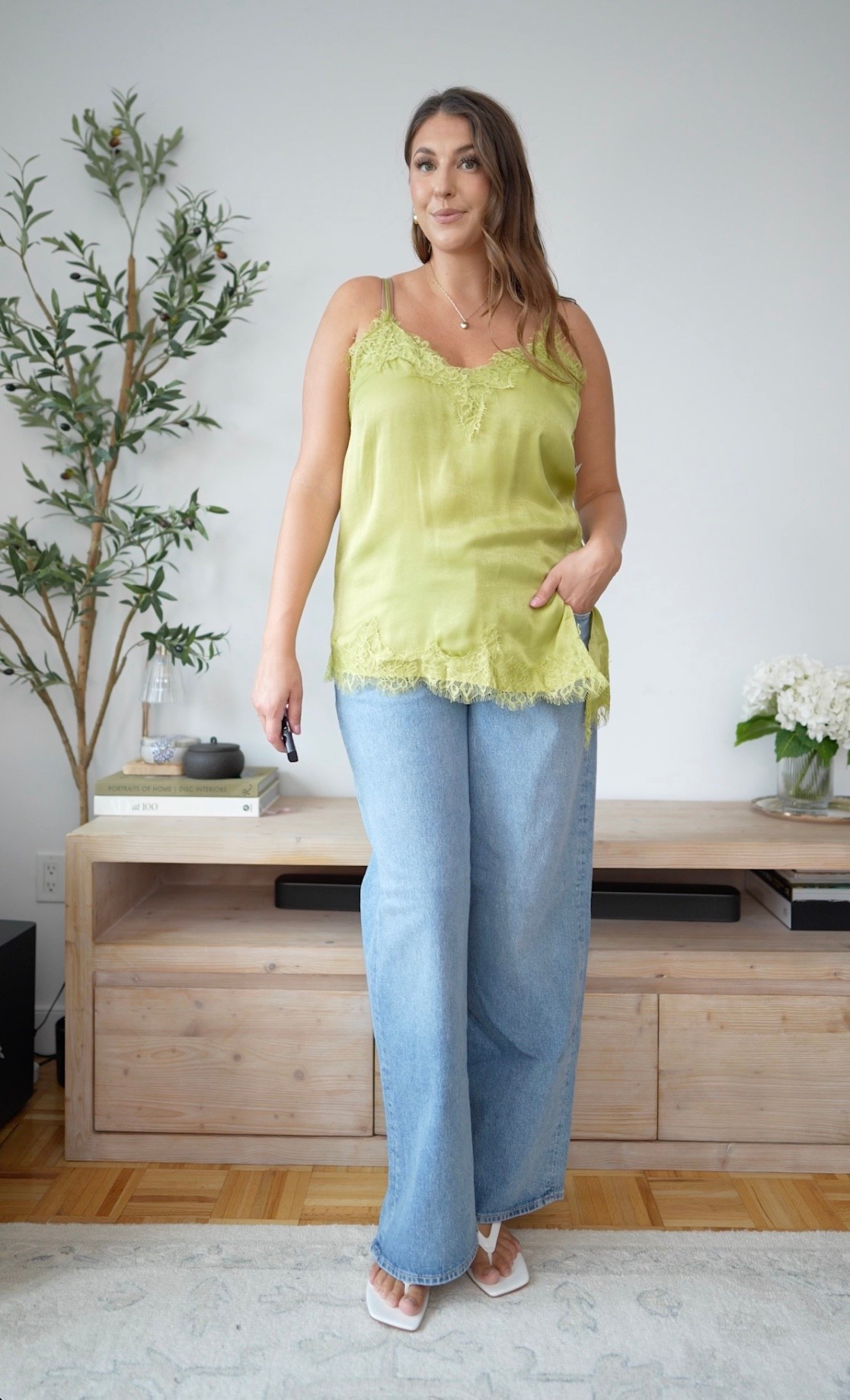 Effortless summer-to-fall style in the prettiest pistachio green. This lace-trim satin cami with relaxed wide-leg denim feels feminine, elevated, and easy for warmer transitional days.

pistachio green top, lace cami, satin tank, wide leg jeans, transitional outfit, summer to fall style, feminine casual outfit, elevated basics, everyday denim

#LTKMidsize #LTKSeasonal #LTKootd