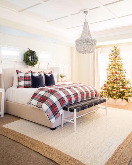 Christmas is in full swing with our master bedroom decor! I've styled our bedroom with a Pottery Barn Stewart plaid duvet with shams, velvet pillows, an upholstered bed, a wood beaded chandelier, raffia nightstands, a bench and more!

coastal christmas, pb inspired, holiday decor, christmas decor, christmas bedroom, serena and lily, christmas pillows, amazon christmas, amazon finds, amazon home, christmas pillows, bedroom bedding, serena and lily bedding, pottery barn bed, pottery barn curtains, master bedroom decor, seasonal decor

#LTKunder50 #LTKunder100 #LTKstyletip

#LTKSeasonal #LTKhome #LTKHoliday