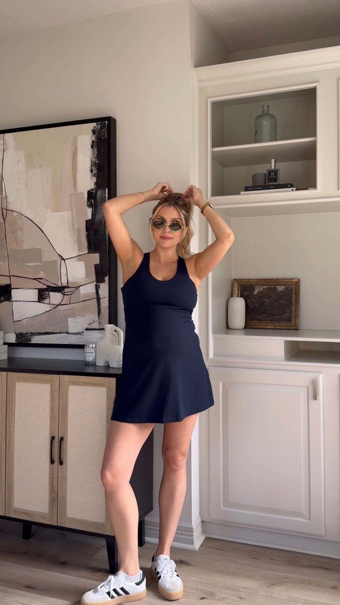 Bump friendly activewear dress | I love this dress because the shorts are not attached to the dress which is great for the bump. Wearing size M in the dress. Sneakers fit tts. 

#LTKStyleTip #LTKBump #LTKActive