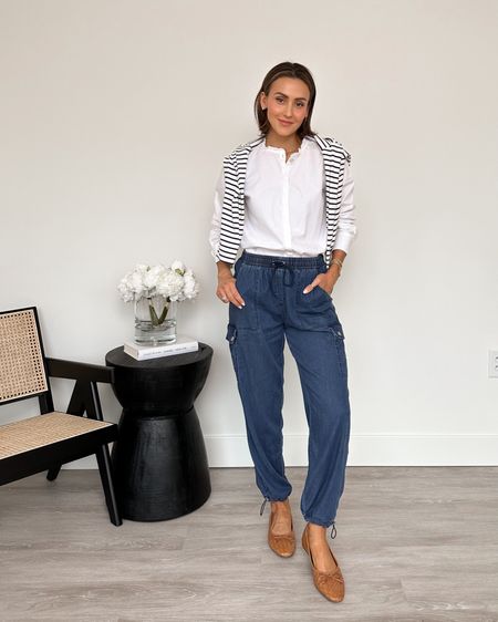 Chicest cargo pant outfit, white shirt and striped tee over the shoulder, all can be work separate or together, great pieces for a capsule wardrobe and even work - all pieces under $30

#LTKworkwear #LTKstyletip #LTKfindsunder50