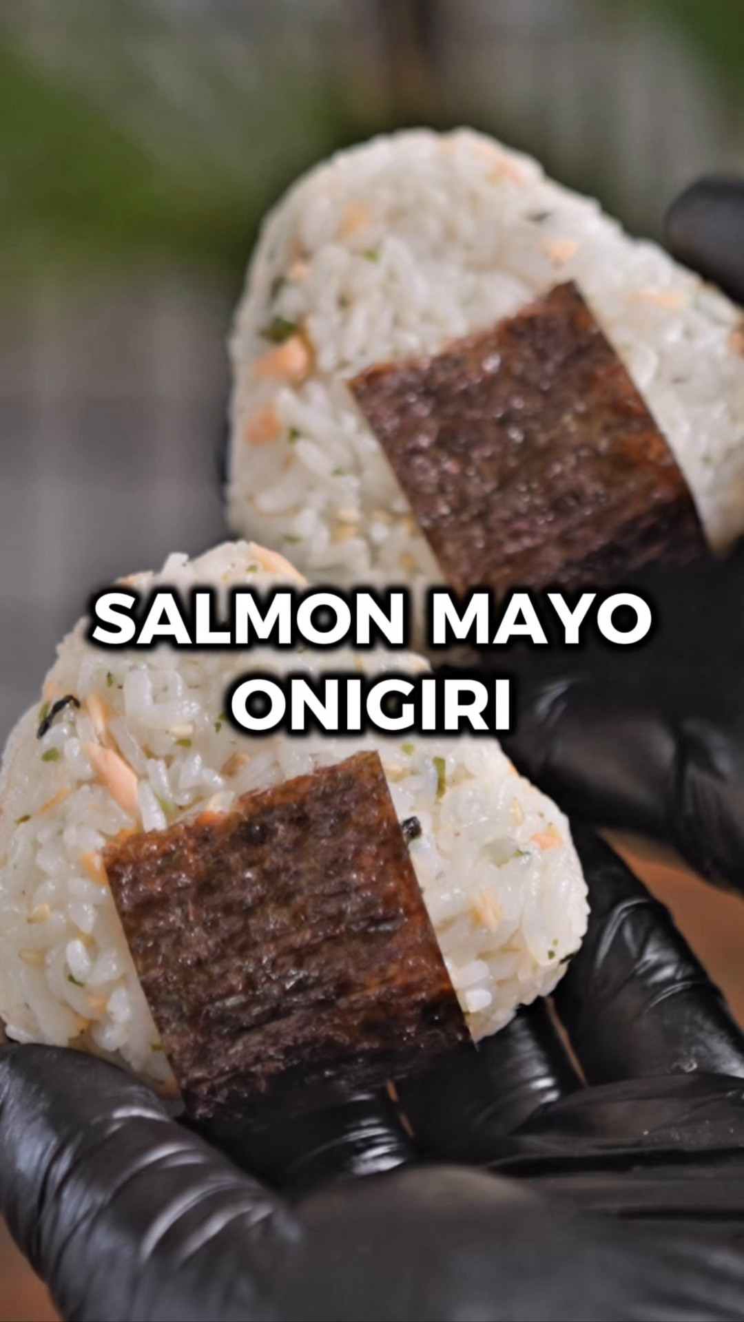 You know how much I love onigiri, and here's another one to add to the list! Salmon is probably my favorite fish, so I can literally devour all 4 of these in one sitting 😋

The trick with these is mixing some of the flaked salmon right into the rice with furikake, and then making a creamy salmon mayo filling for the center with cream cheese and Kewpie Mayo. So you're getting salmon in every single bite. They're perfect for lunch, snacking, or meal prep.

Would you try it? Let me know in the comments what you think if you do! 🙌

INGREDIENTS
1 salmon filet (7 oz)
vegetable oil (for cooking)
salt and pepper (to taste)
2 cups short grain white rice (cooked)
2 tbsp furikake
1 oz cream cheese
2 tbsp Kewpie Mayo
1 sheet sushi nori

INSTRUCTIONS
1️⃣ Preheat the oven to 400°F. Place the salmon filet on a baking pan, drizzle with vegetable oil, season with salt and pepper, and bake for 12 minutes.
2️⃣ Cook your rice however you prefer. Add it to a medium mixing bowl.
3️⃣ Flake the salmon in a small bowl. Add about 1/3 of it to the rice along with the furikake and mix well.
4️⃣ In a separate bowl, combine the remaining salmon with the cream cheese and Kewpie Mayo.
5️⃣ Grab some rice and flatten it into a palm sized disk in your hand. Add about a tbsp of the salmon mayo filling to the center. Flatten another clump of rice in your other hand and place it over the top. Gently squeeze together to form a ball and shape into a triangle if you'd like. Repeat for the remaining rice to make 4 rice balls.
6️⃣ Cut the nori into long strips about an inch wide, then cut those in half. Wrap them around the rice balls.
7️⃣ Enjoy!

#LTKfoodie #LTKHome