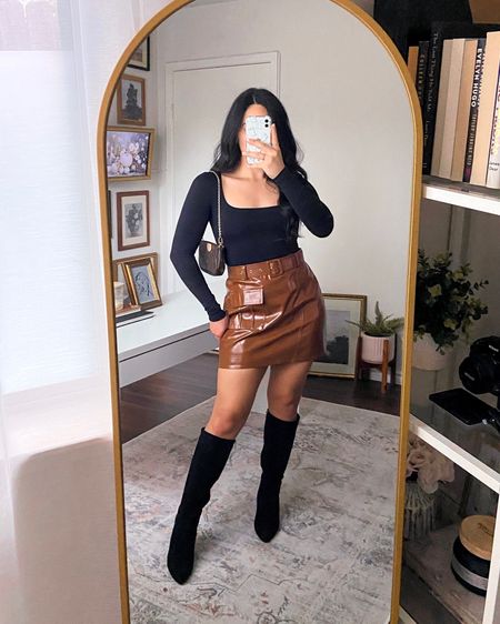 Ways To Style a Black Long Sleeve Bodysuit: Outfit 10

Get 15% off SHEIN items with code Q3YGJESS

🏷️: amazon fashion, black long sleeve square neck bodysuit, skims dupe bodysuit, brown faux leather skirt, black knee high boots, chunky heel boots, designer dupe bag, louis vuitton dupe bag, dressy casual fall outfit, dressy casual fall style, dressy casual outfit, fall outfit with black bodysuit, mini skirt fall outfit

#LTKstyletip #LTKshoecrush