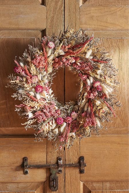 Welcome the beauty of spring into your home with this exquisite hand-crafted dried wreath, featuring an abundance of tonal pink florals. Perfect for adding a touch of elegance and charm to any space, this wreath is a delightful seasonal adornment.

Stunning Design:** Hand-crafted with a variety of tonal pink florals, each wreath is unique, showcasing the natural beauty of dried flowers.

Quality Materials:** Made with a sturdy twig base and a mix of dried florals, this wreath is designed for durability and beauty.

Versatile Use:** Ideal for indoor or sheltered outdoor display, bringing a touch of springtime to your door, wall, or mantel.

Care Instructions:** To maintain its beauty, avoid exposure to excessive moisture and direct sunlight.

Handmade with Love:** Each wreath is made from natural materials in the USA, ensuring slight variances that add to its unique charm.

Celebrate the season with the timeless elegance of the tonal pink floral dried wreath. 

Order yours today and let the beauty of spring brighten your home!

#LTKHome #LTKGiftGuide #LTKSeasonal