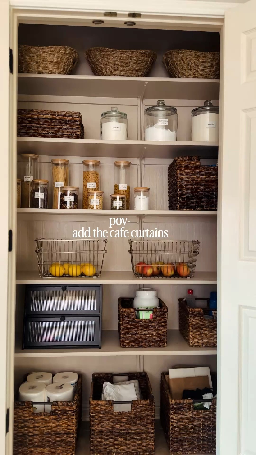 Add the cafe curtains! 
If you have something’s that you wish to hide  under a shelf or table simple add a tension rod with some cafe curtains to hide the chaos! 

It’s so cute I’m obsessed with how the cafe curtains turned out in my pantry! 🤌🏼🤌🏼
#cafecurtains #homeorganization #homedecor #pantrydesign #pantrydesign 

#LTKHome #LTKSeasonal #LTKSaleAlert